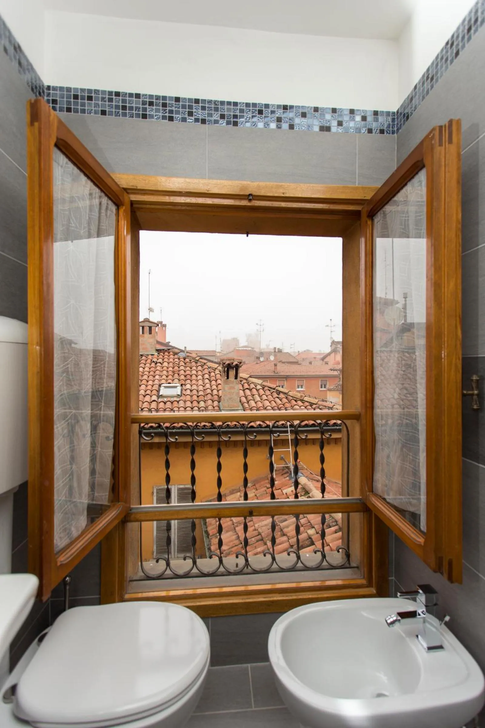 Bathroom in Residenza Ariosto Depandance by Studio Vita