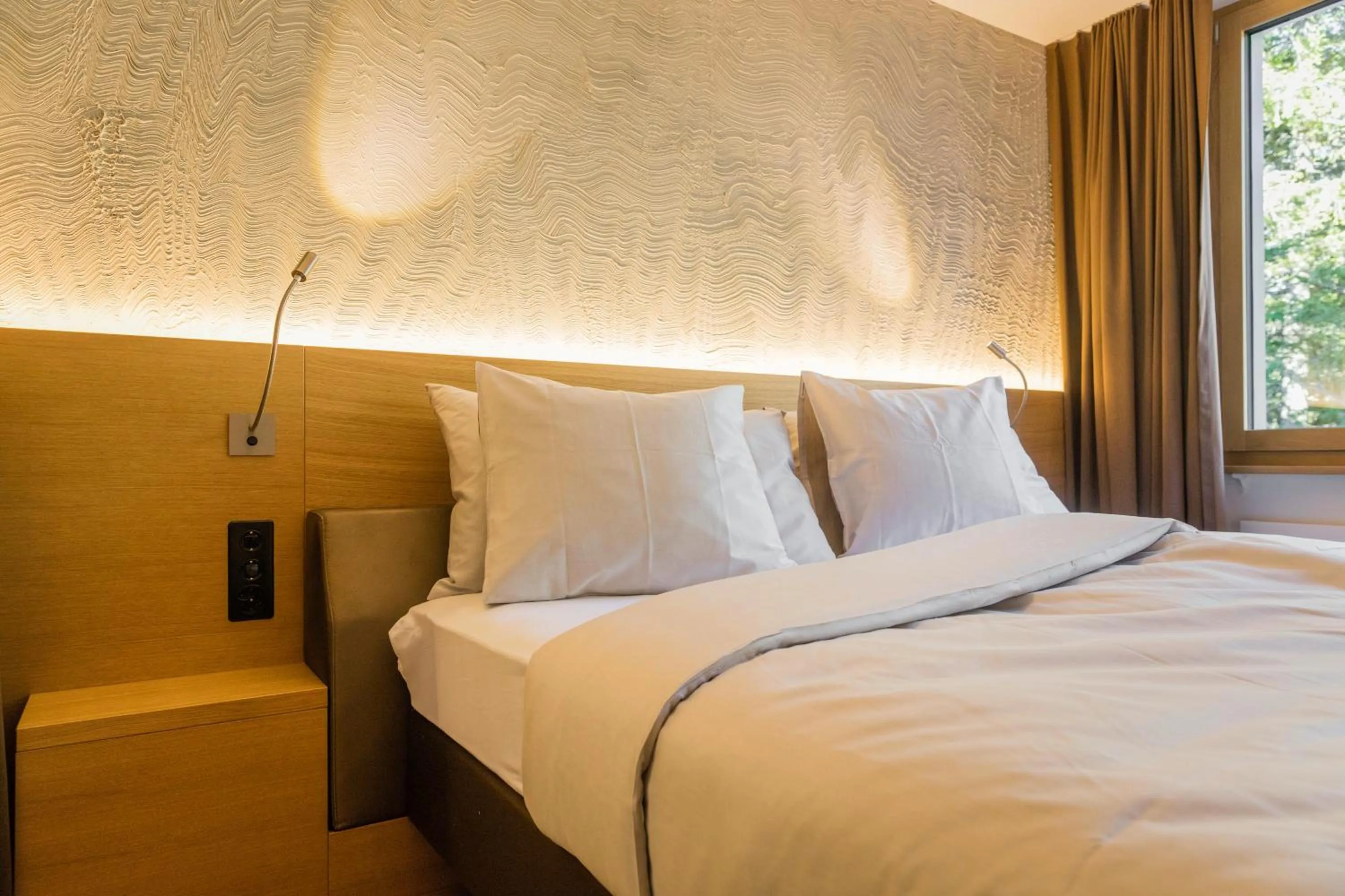 Photo of the whole room, Bed in Säntis - das Hotel