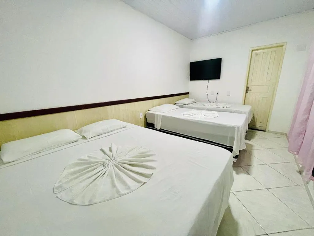 Bed in Pousada Campo Verde