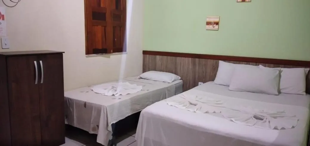 Bed in Pousada Campo Verde