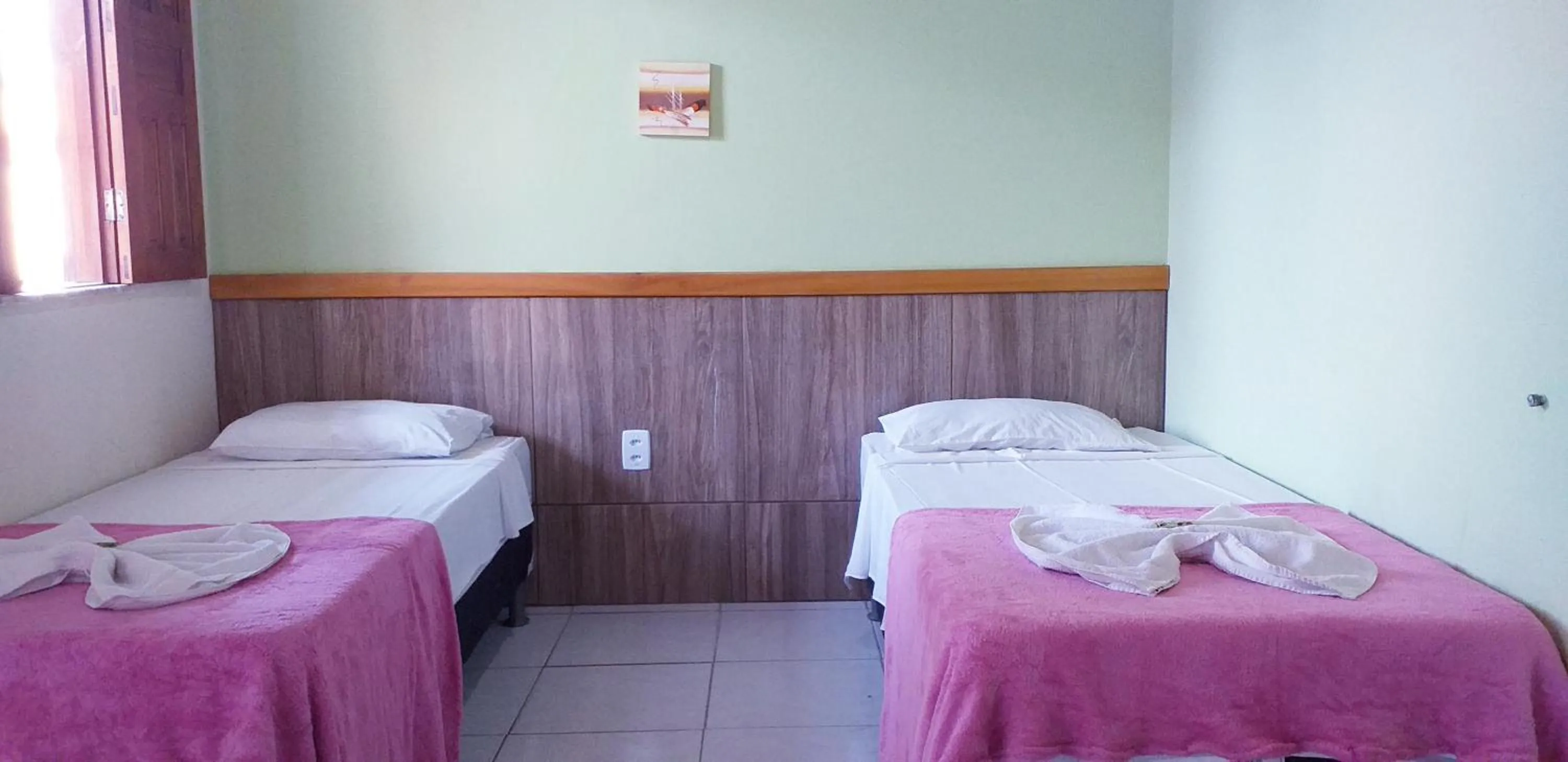 Bed in Pousada Campo Verde