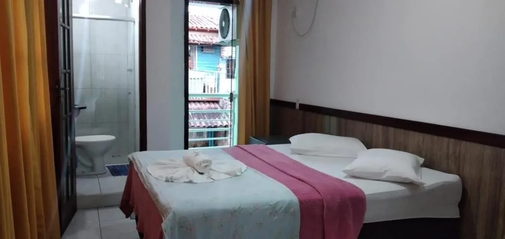 Bed in Pousada Campo Verde