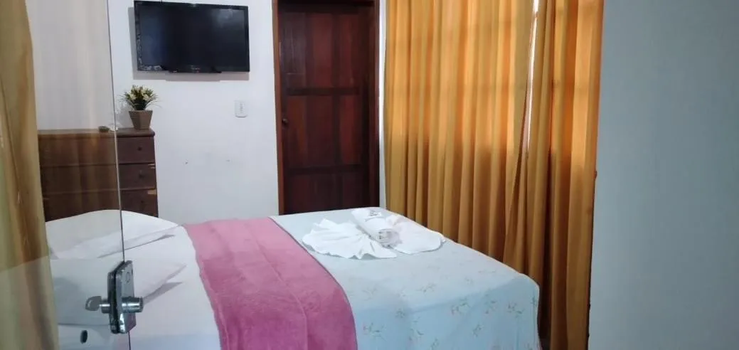 Bed in Pousada Campo Verde