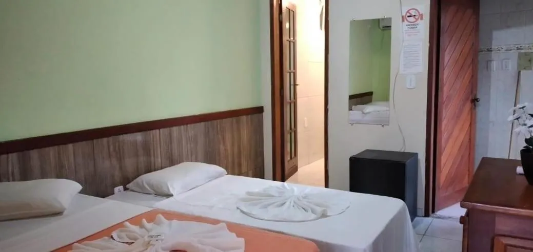 Bed in Pousada Campo Verde