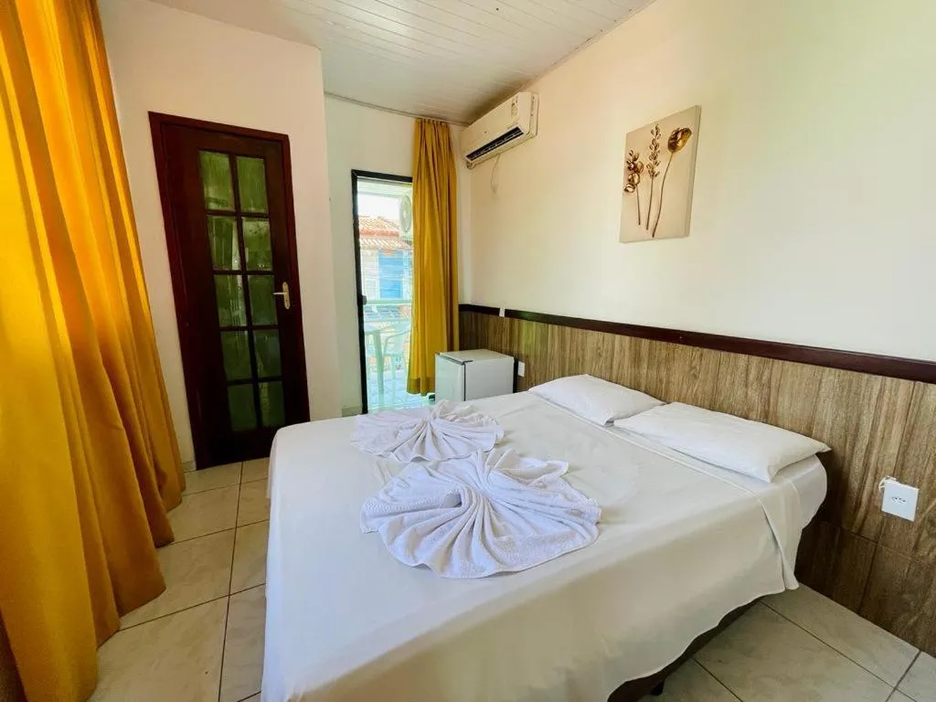 Bed in Pousada Campo Verde