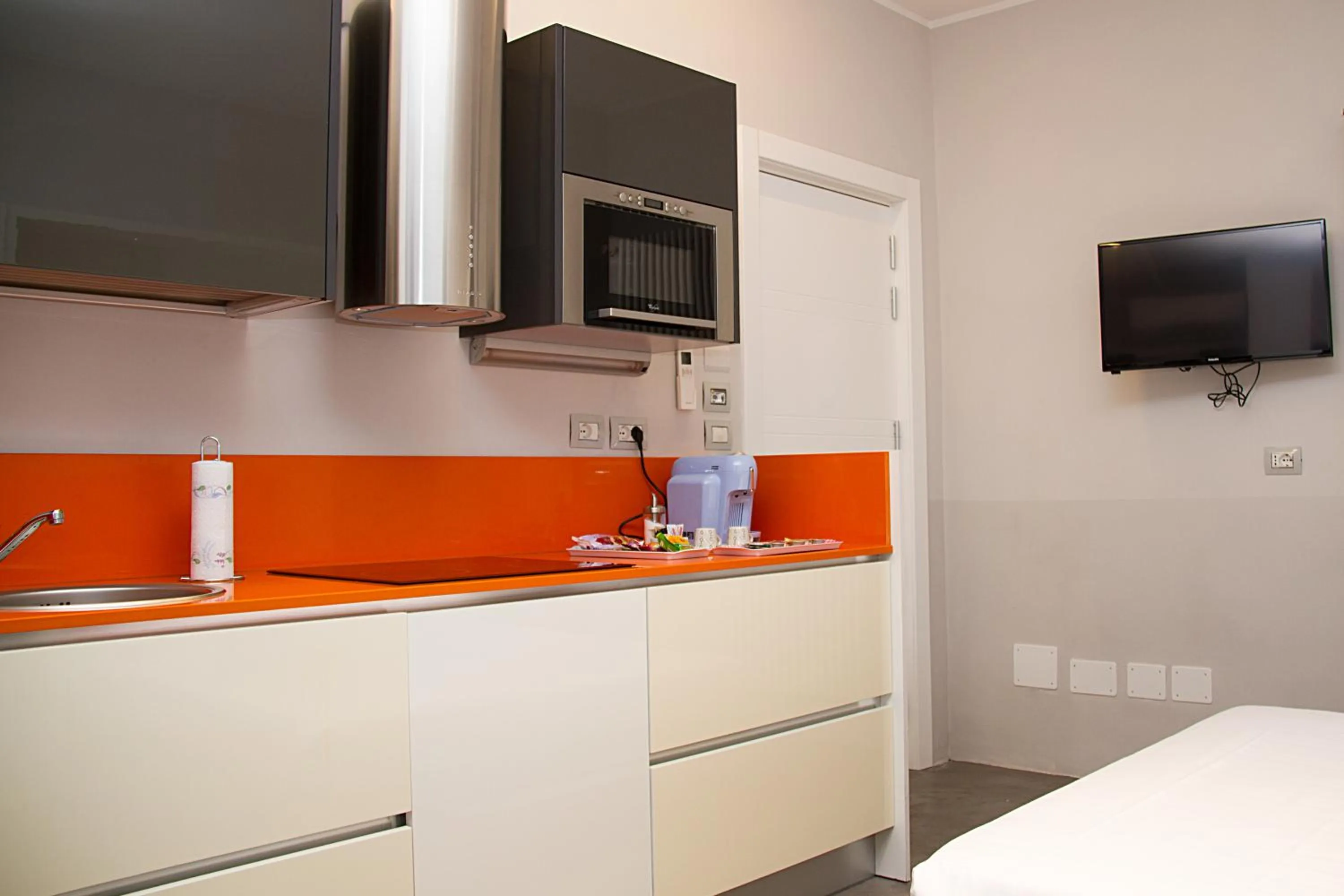 Kitchen or kitchenette in Piazza Castello Suite