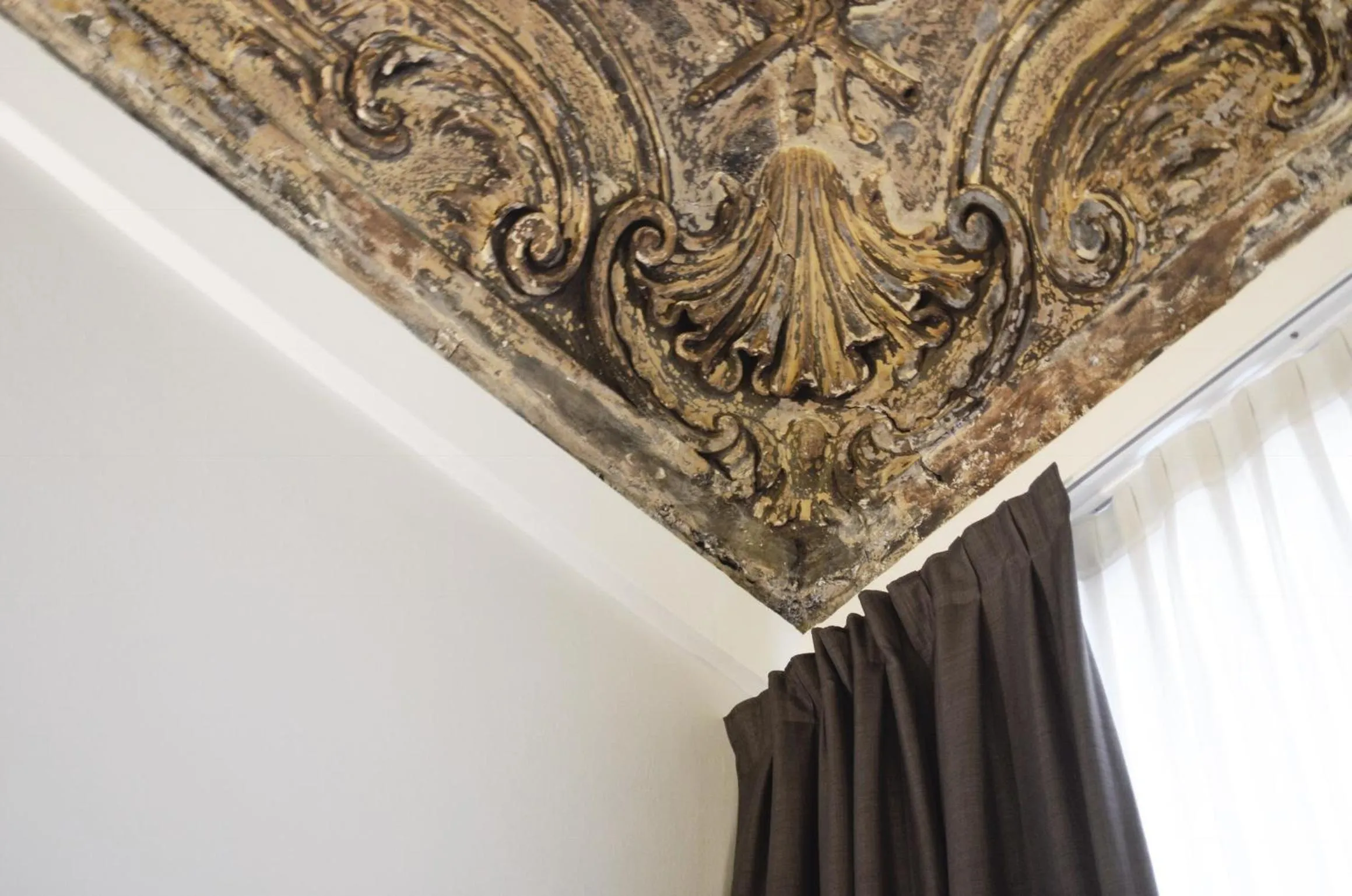 Decorative detail in Piazza Castello Suite