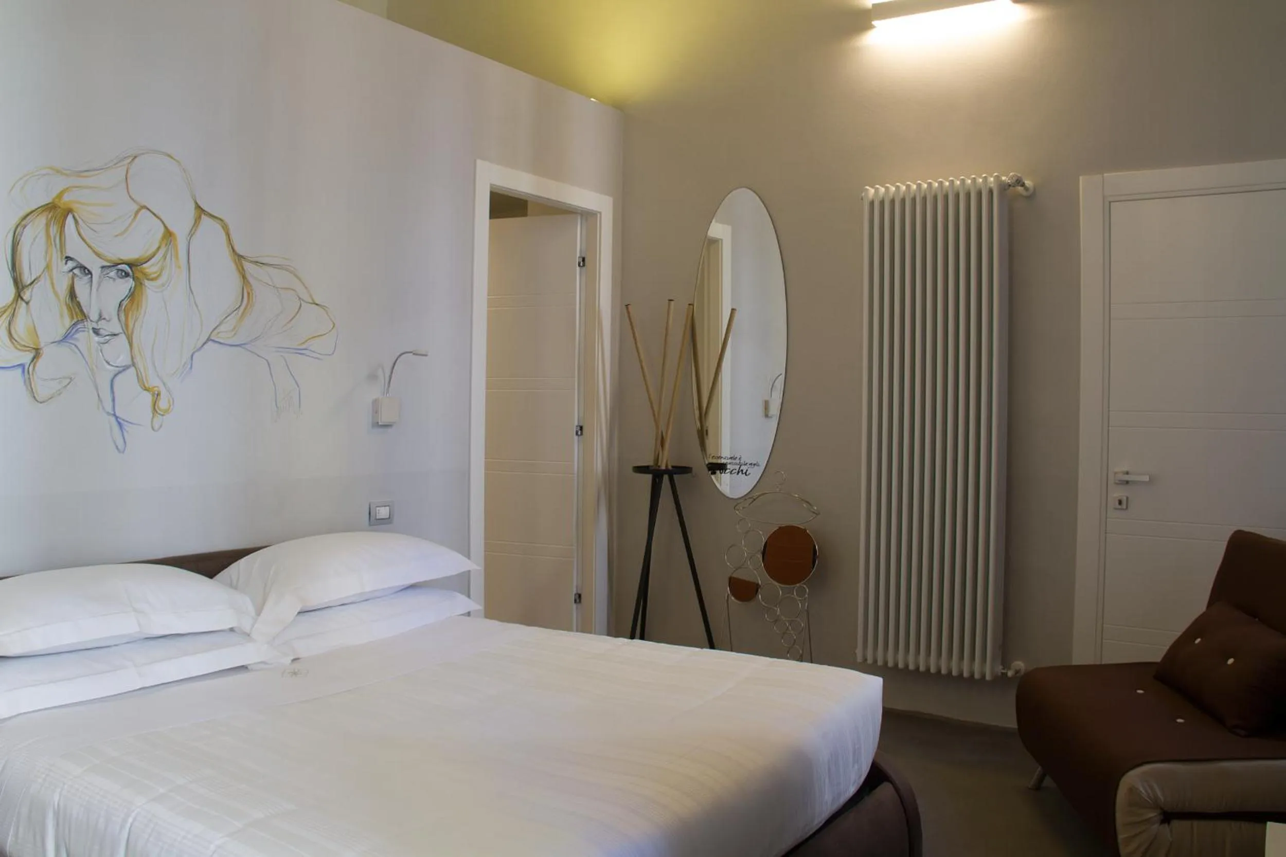 Photo of the whole room in Piazza Castello Suite