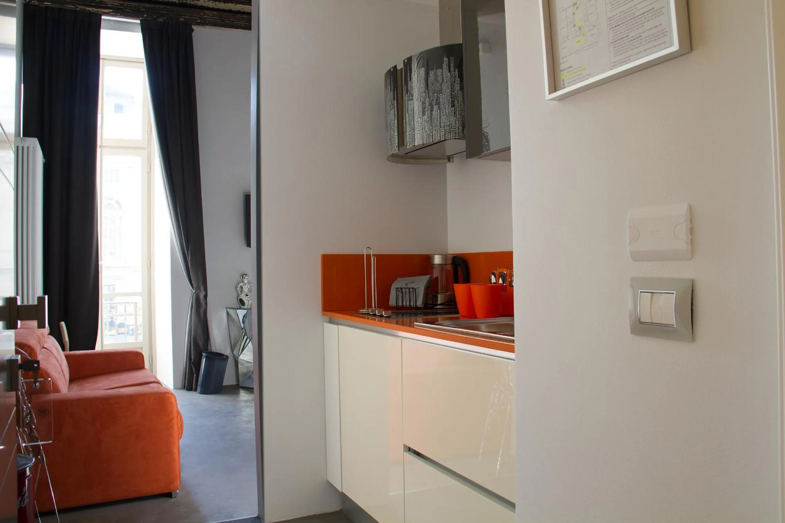 Kitchen or kitchenette in Piazza Castello Suite