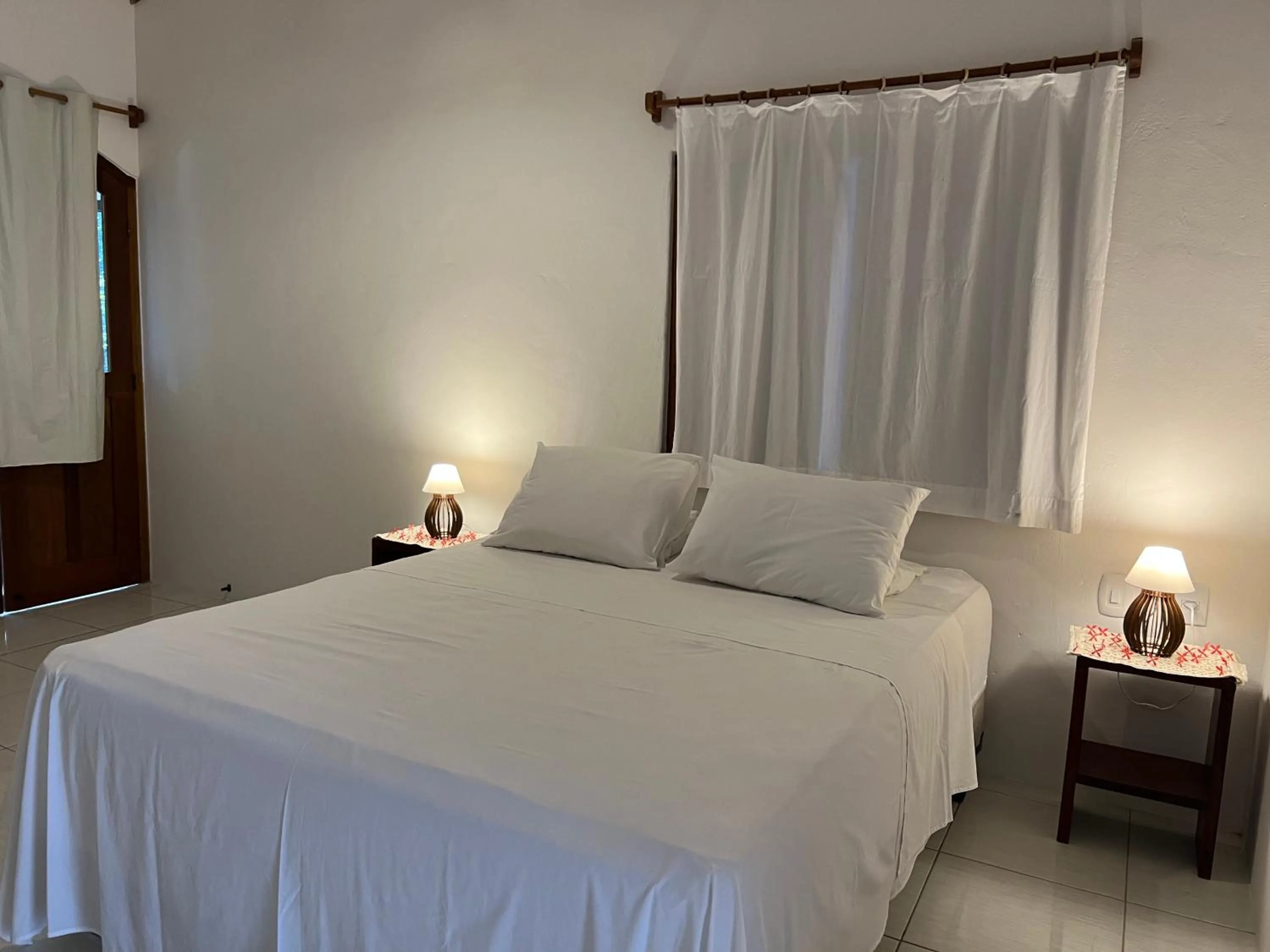 Photo of the whole room, Bed in Pousada Pandoro