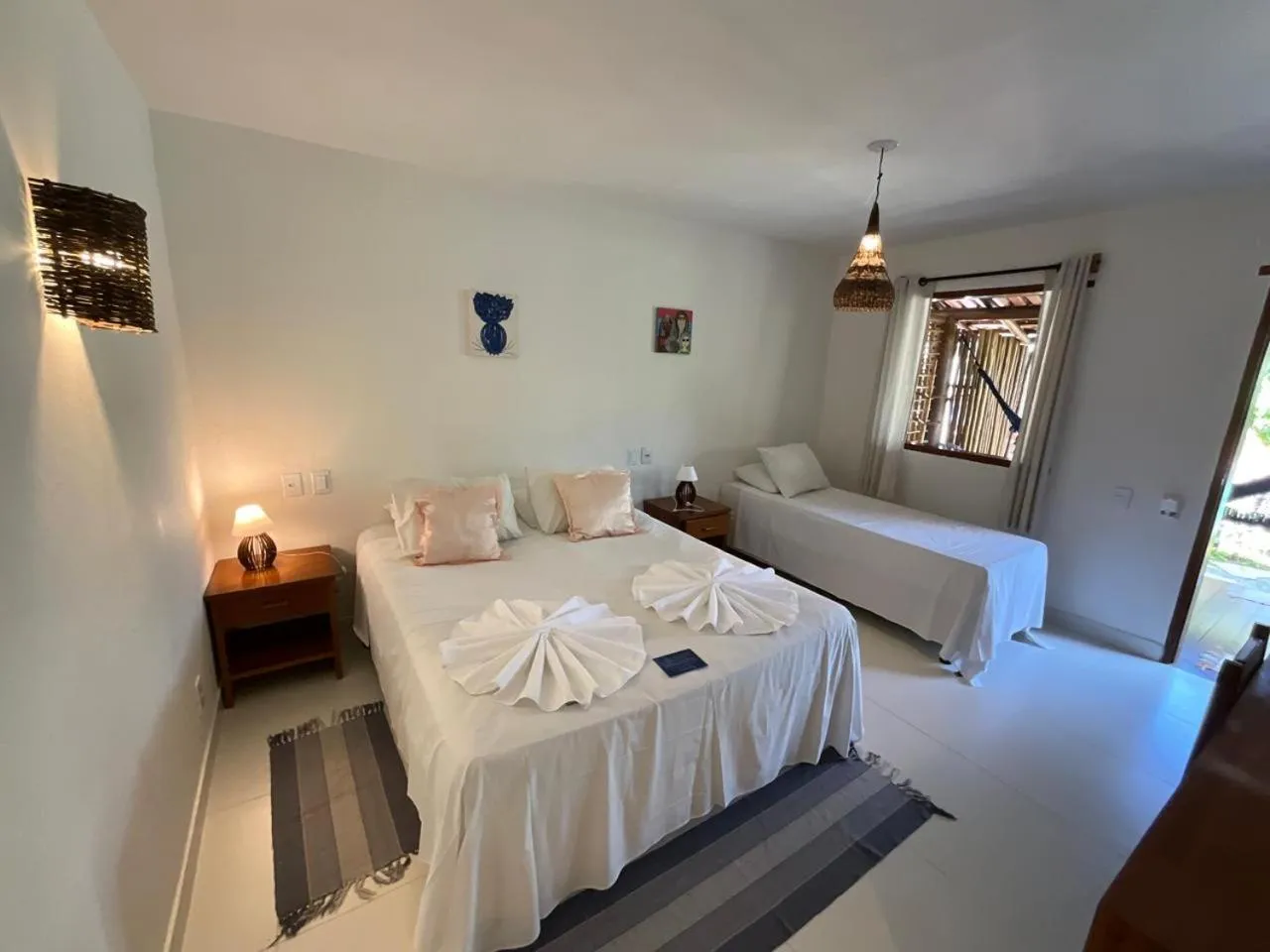 Bed in Pousada Pandoro