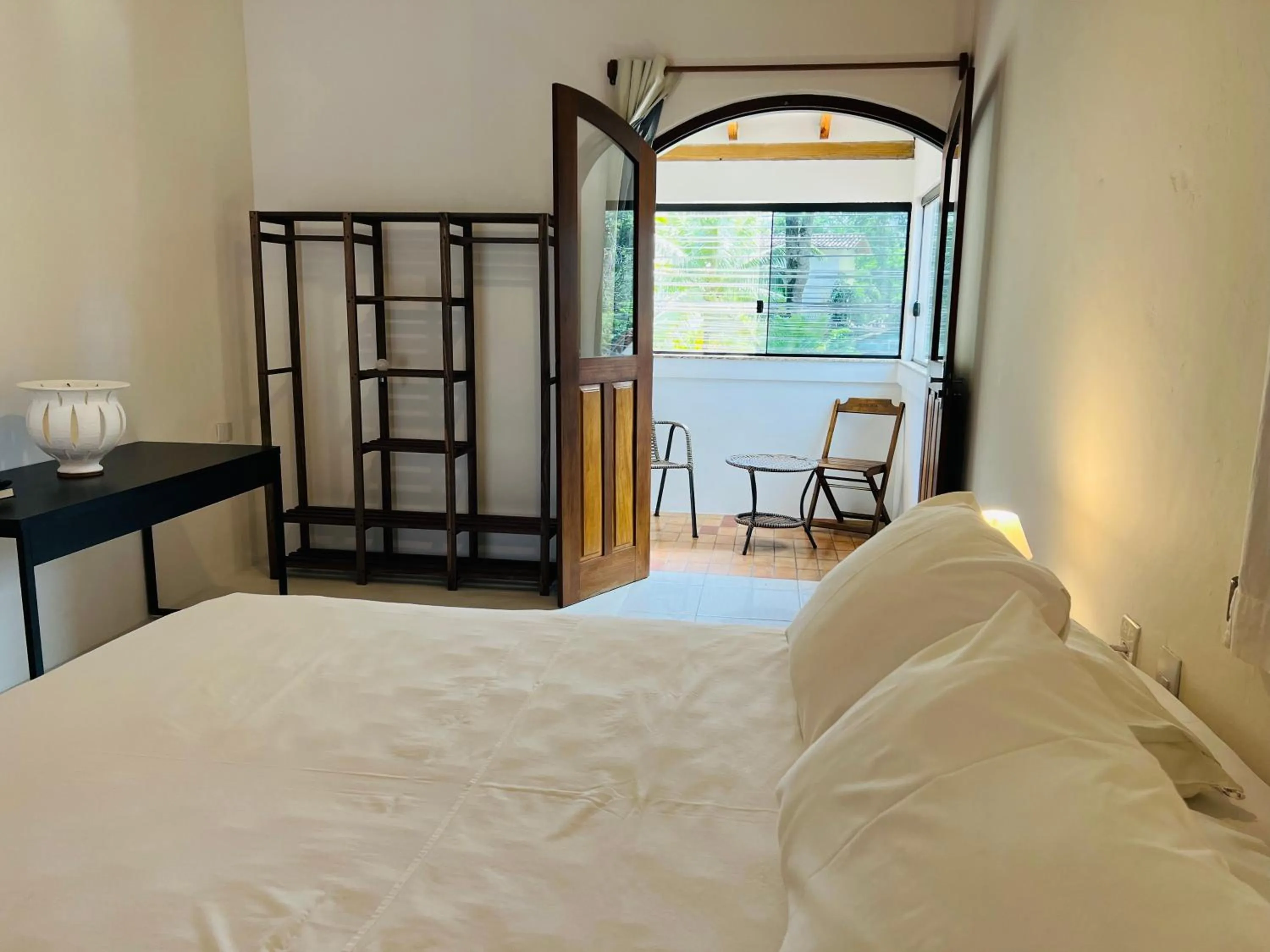 Photo of the whole room, Bed in Pousada Pandoro