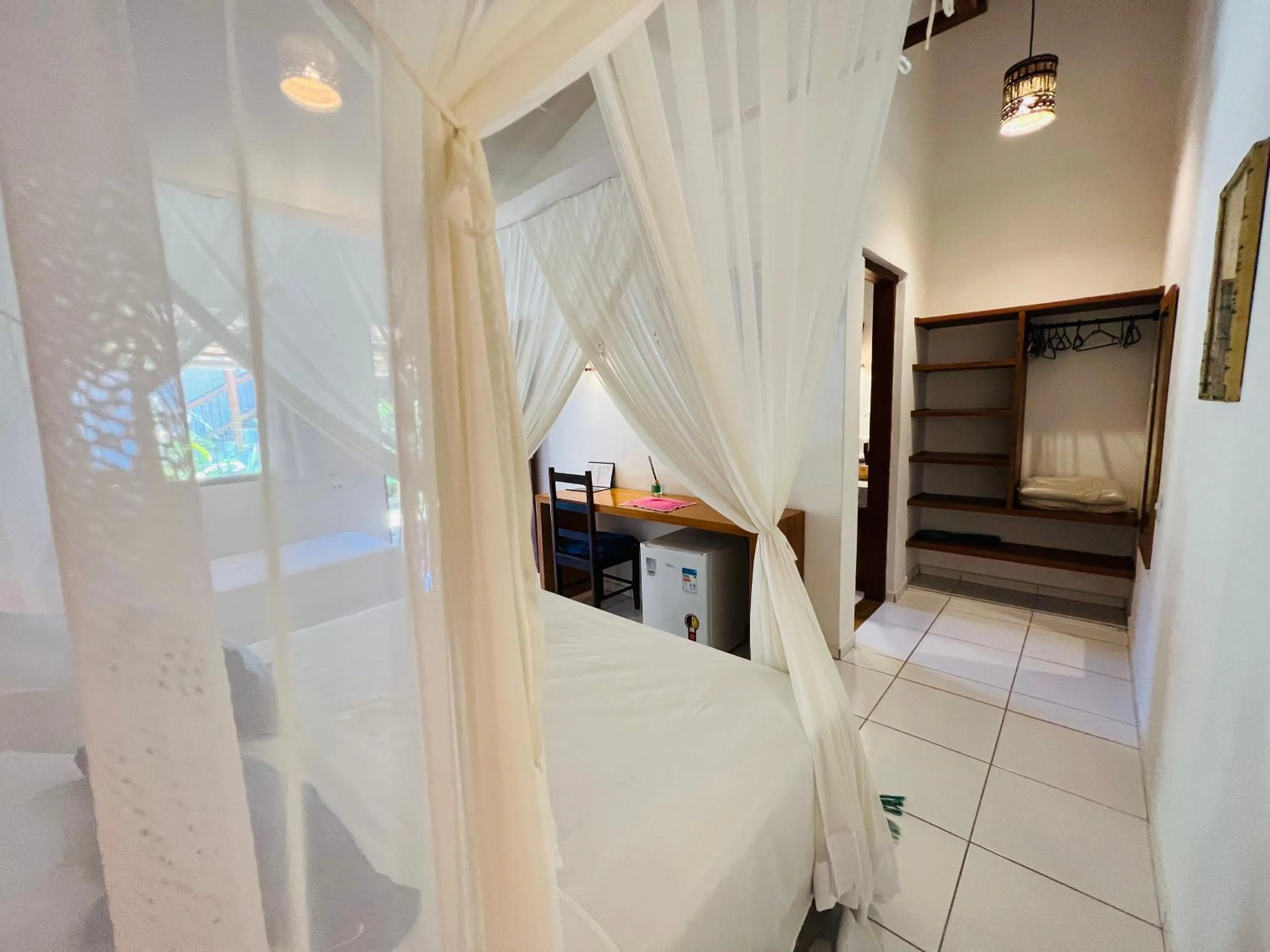 Photo of the whole room, Bed in Pousada Pandoro