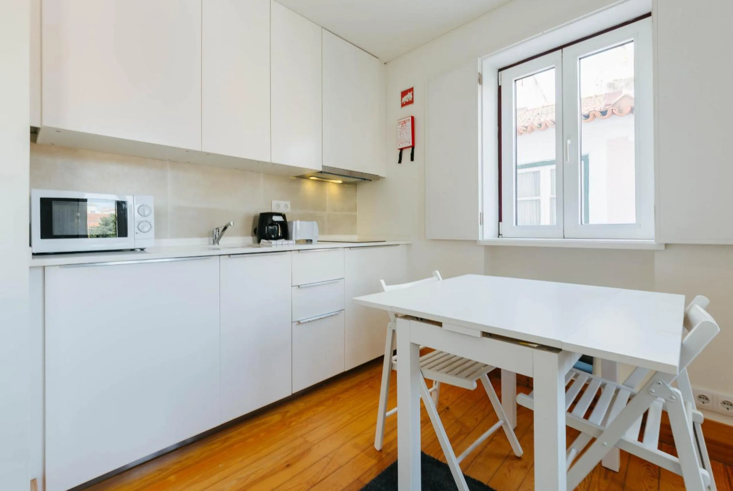 Kitchen or kitchenette in RENT4REST LISBON DOWNTOWN TINY STUDIO Apartments