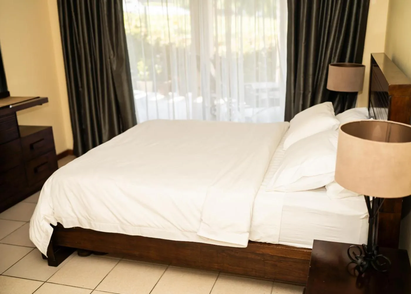 Bed in De Wingerd Wijnland Lodge