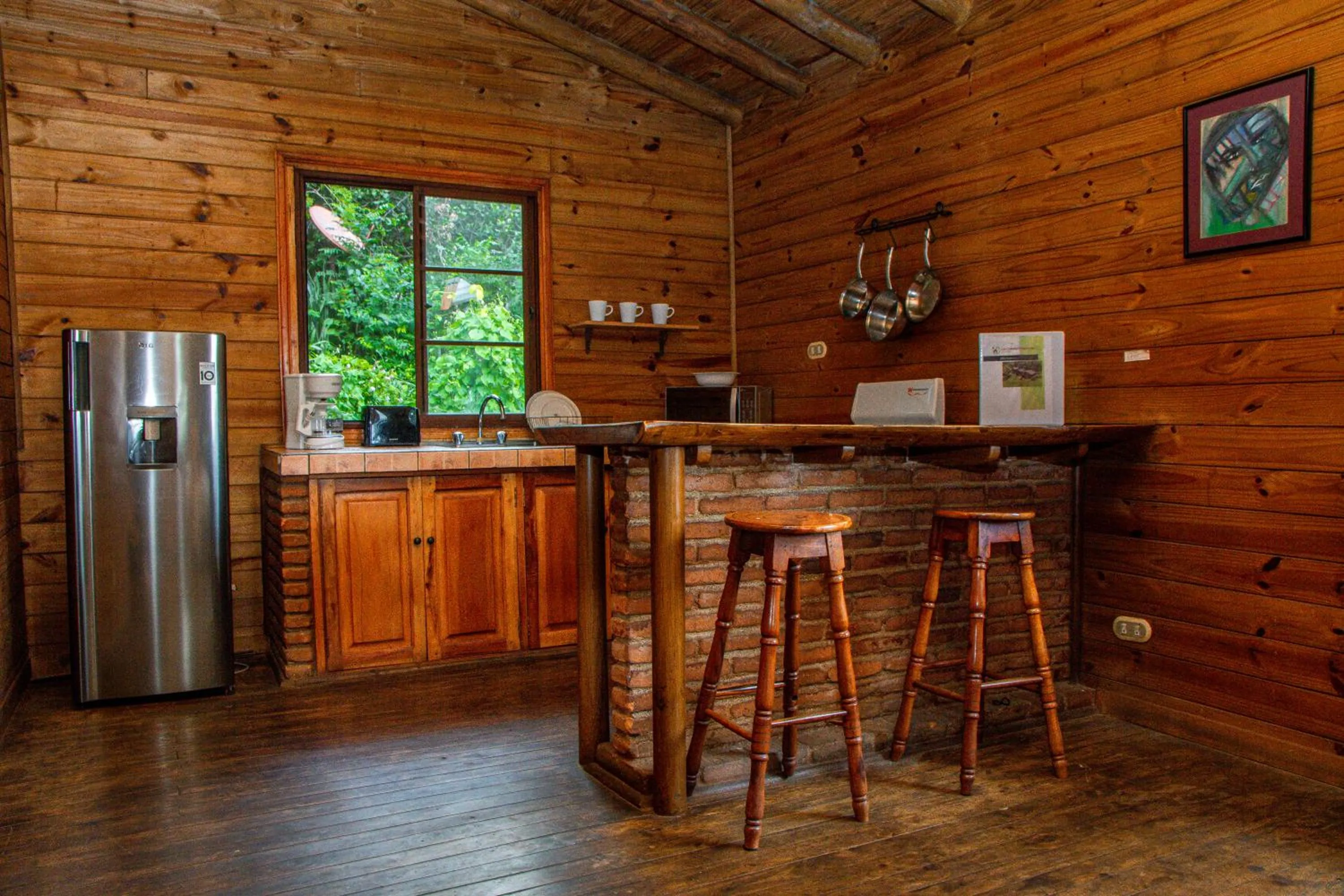 Kitchen or kitchenette in Las Cabañas Encantadas de Nindirí