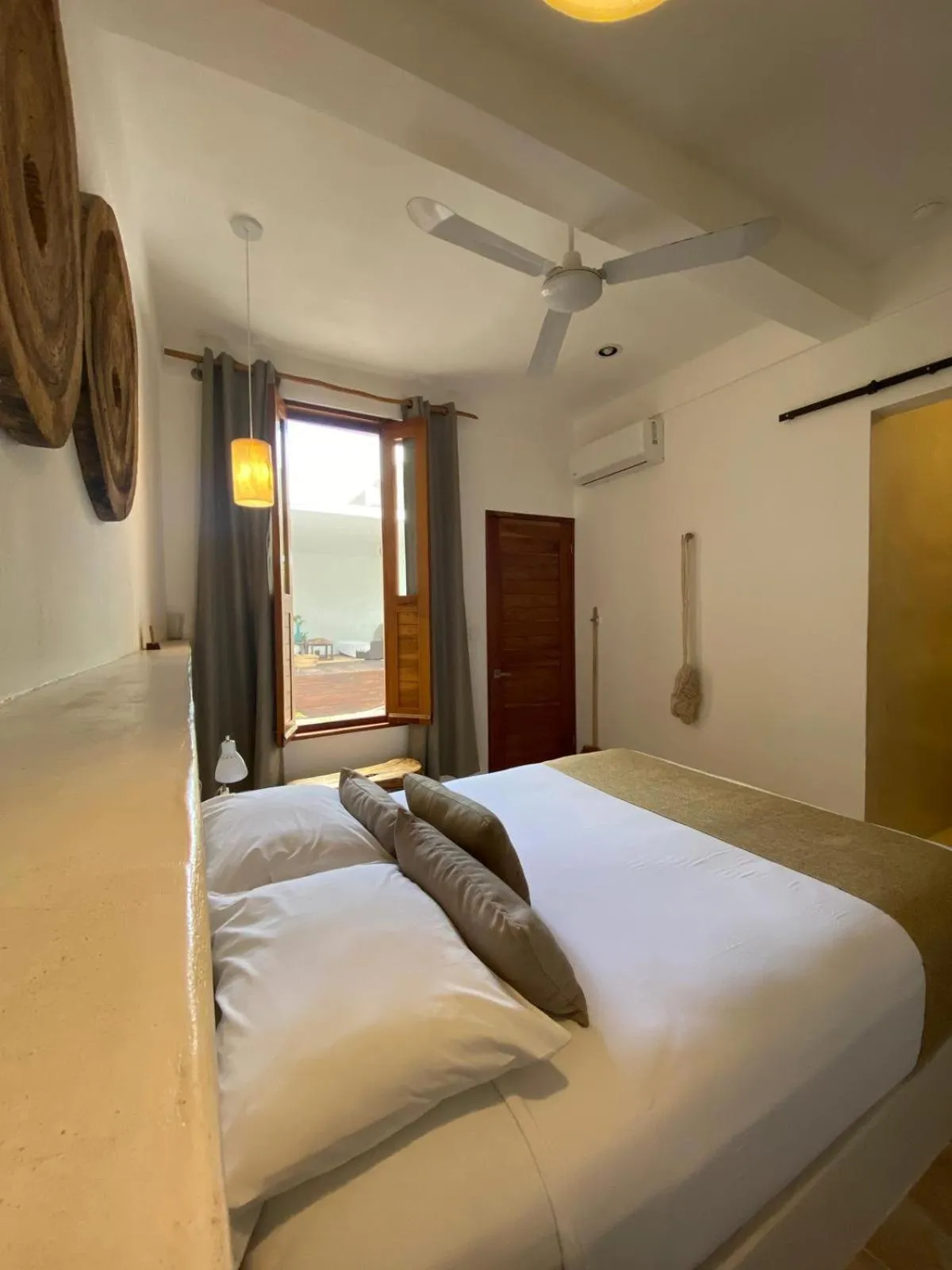 Bed in Holbox Deluxe Apartments