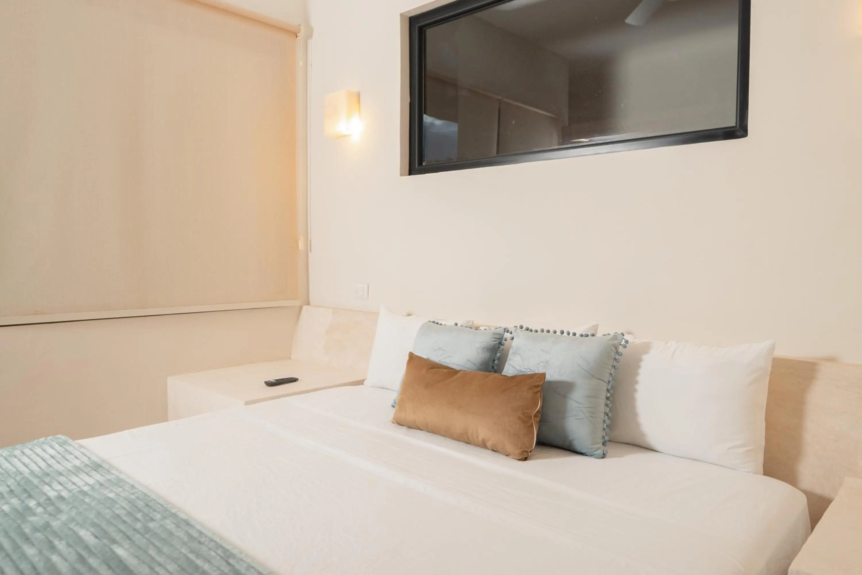 Bed in Holbox Deluxe Apartments