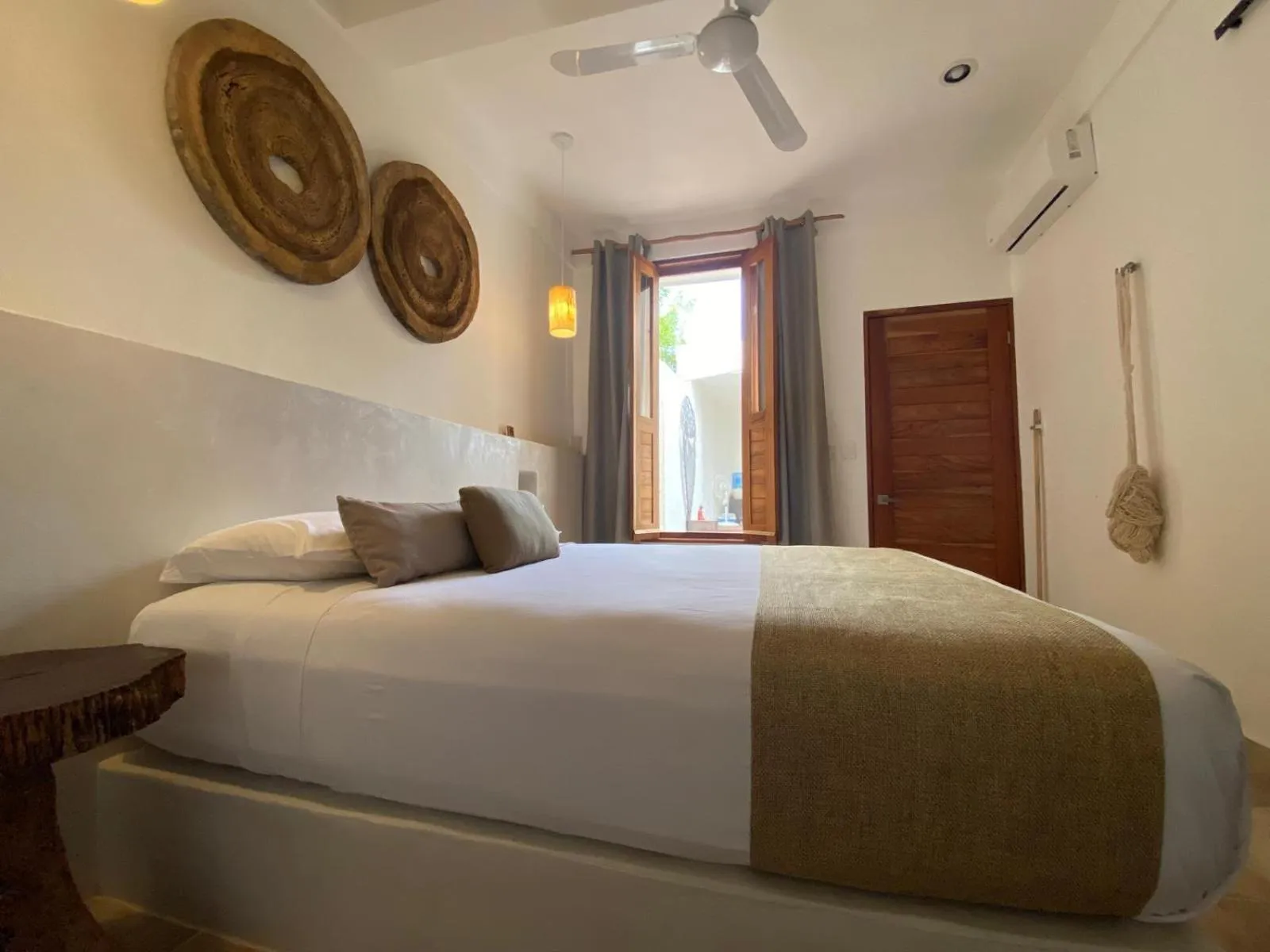 Bed in Holbox Deluxe Apartments