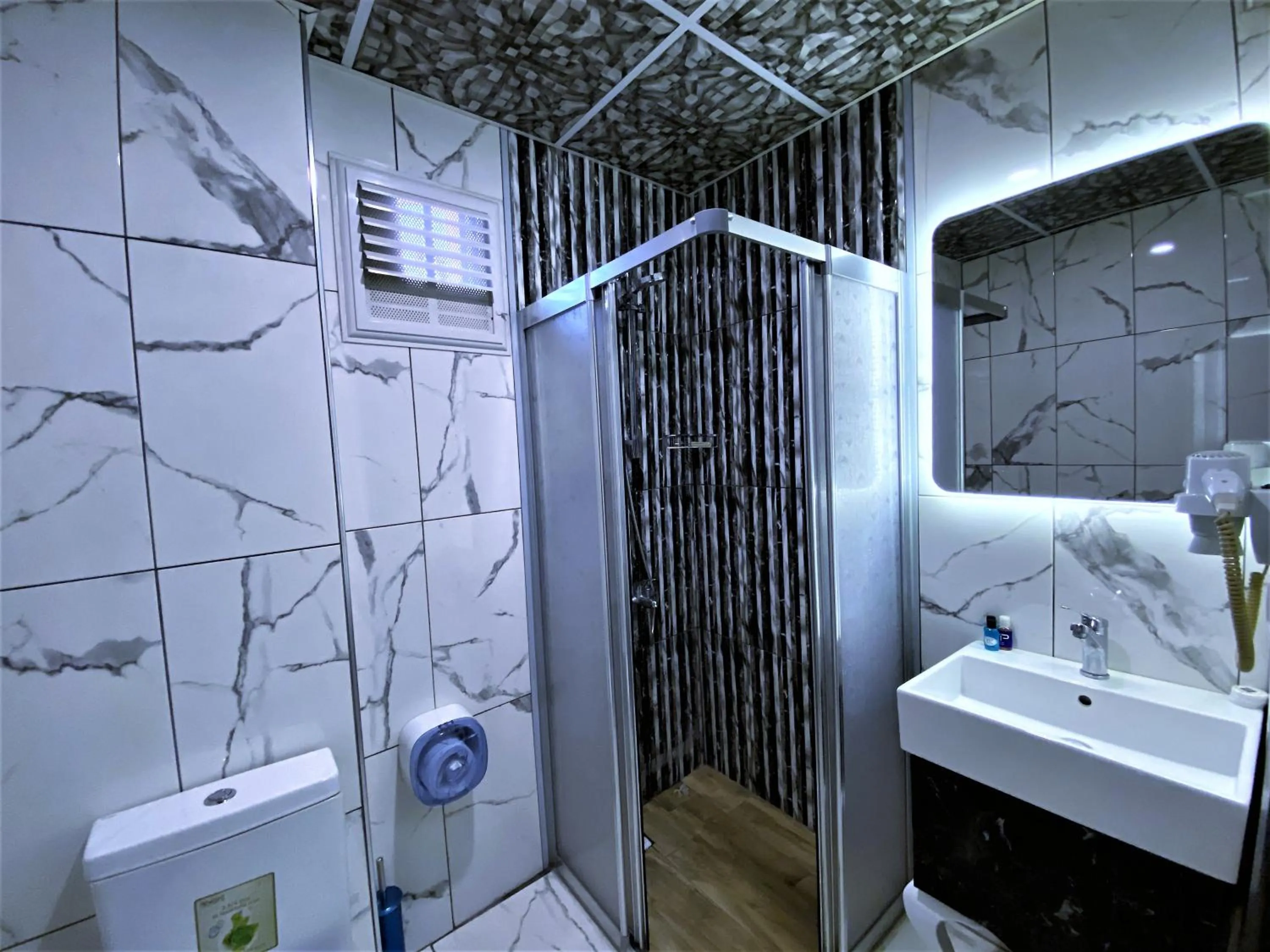 Bathroom in Orange Airport Hotel