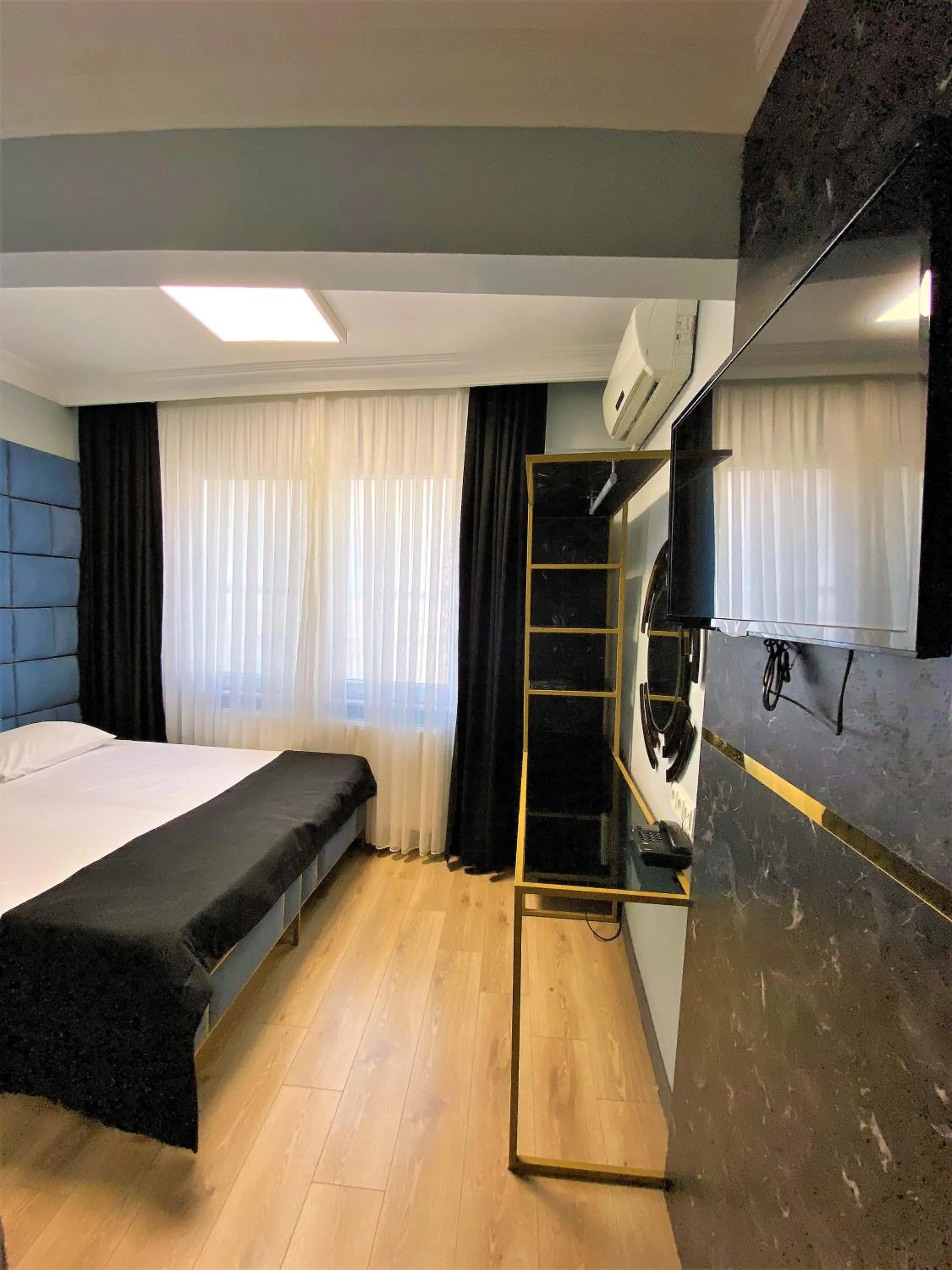 Bed in Orange Airport Hotel