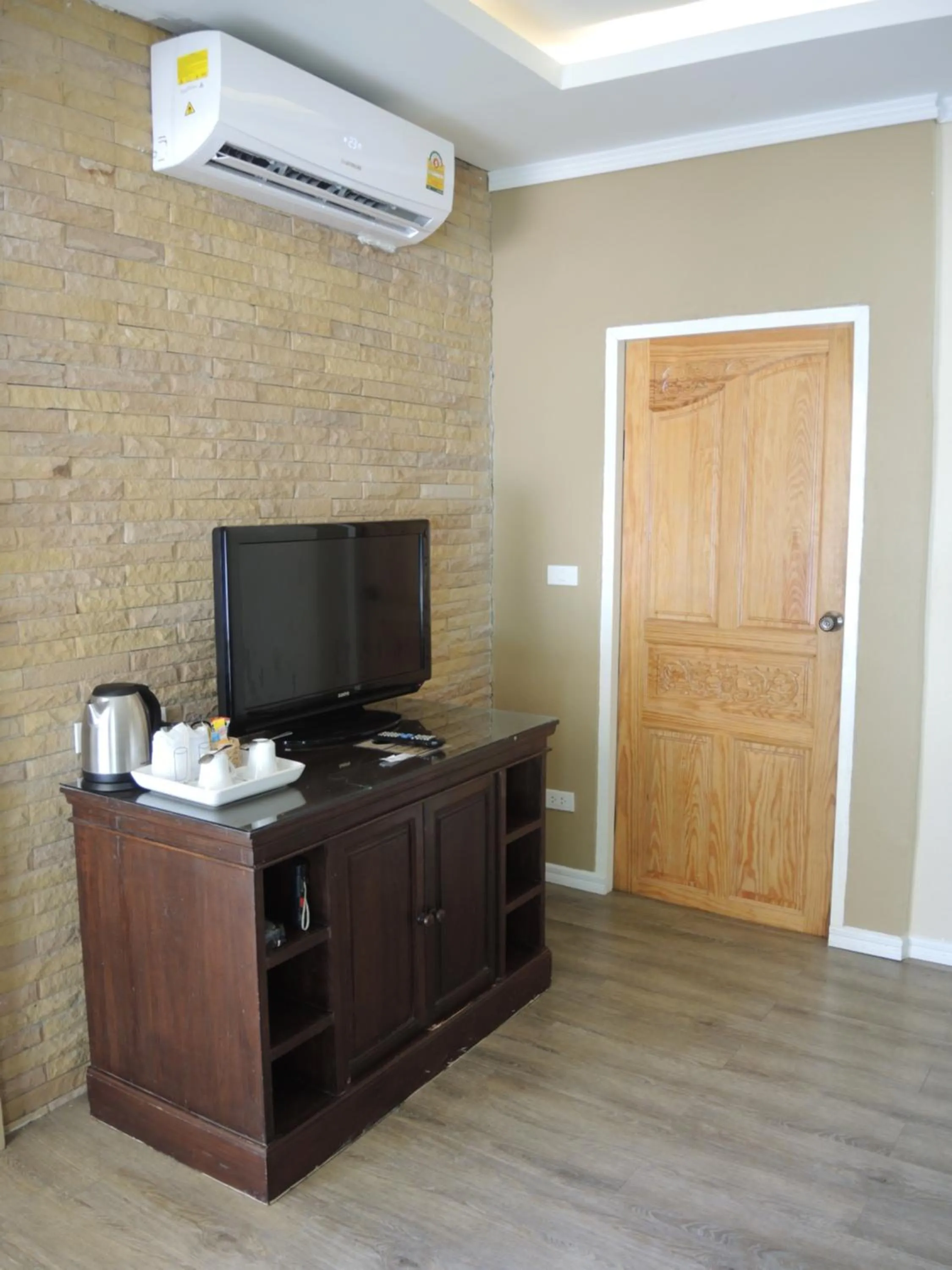 TV and multimedia in The C Samet Beach Resort SHA Plus