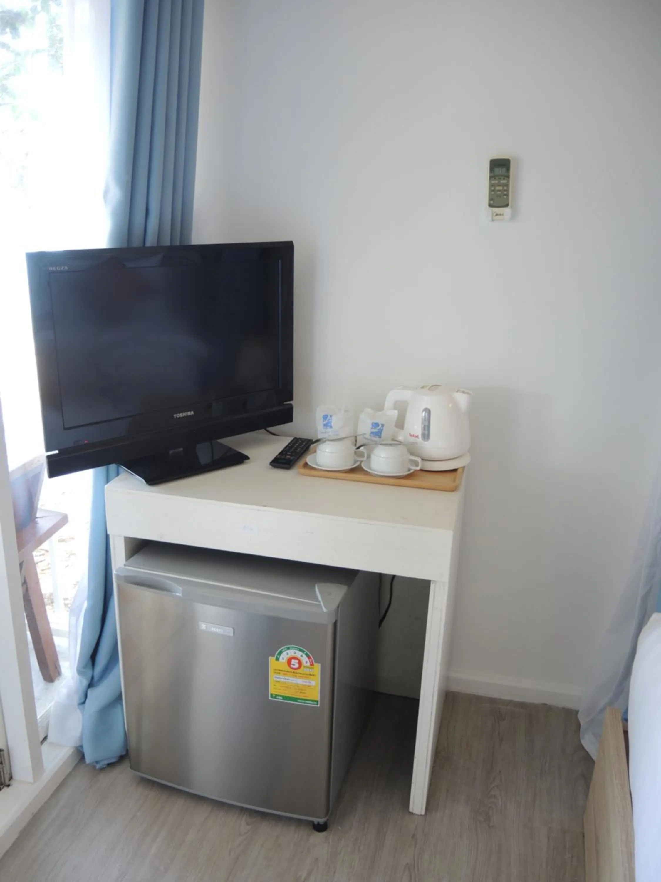 TV and multimedia in The C Samet Beach Resort SHA Plus