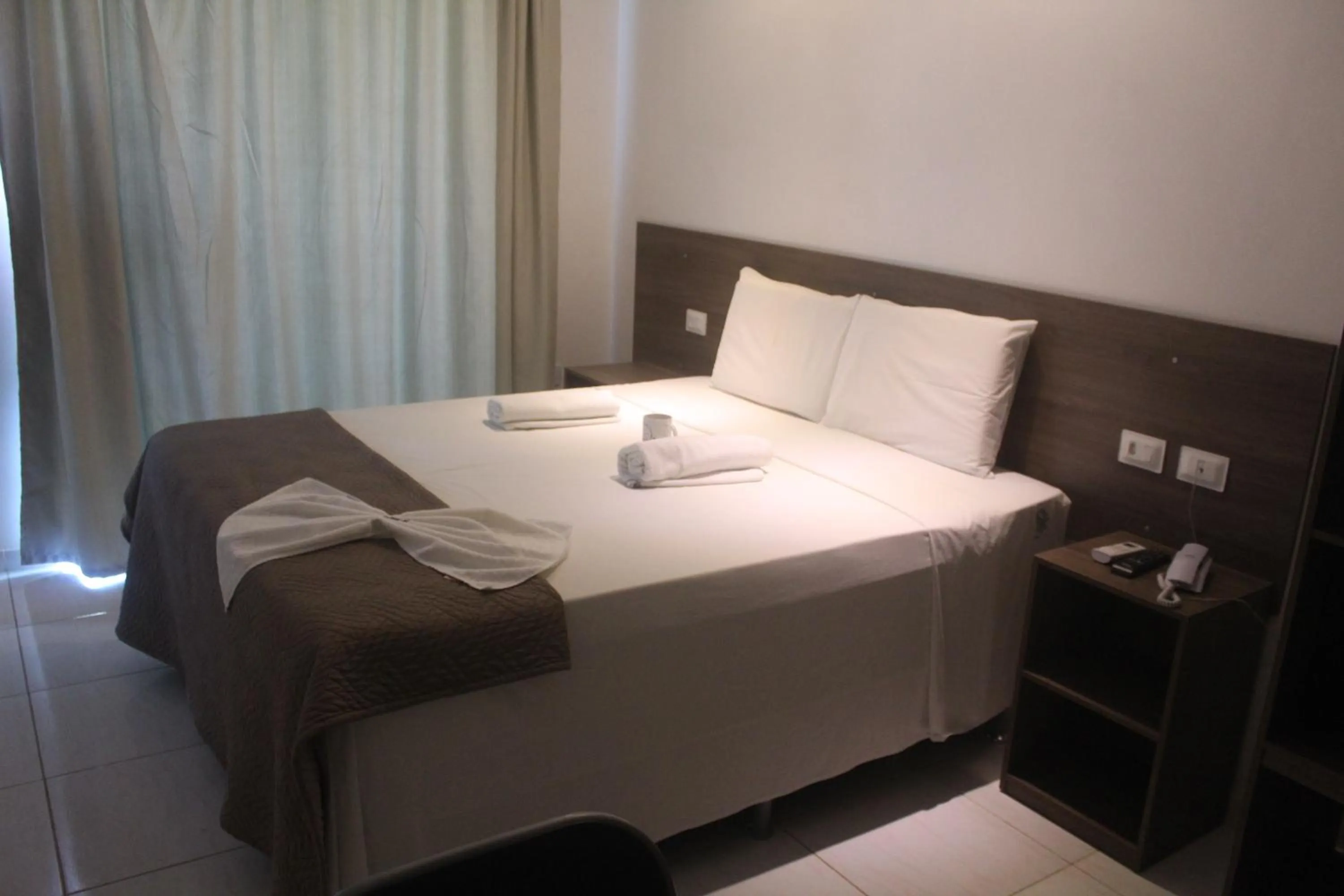 Bed in Pousada Sky Beach Flat