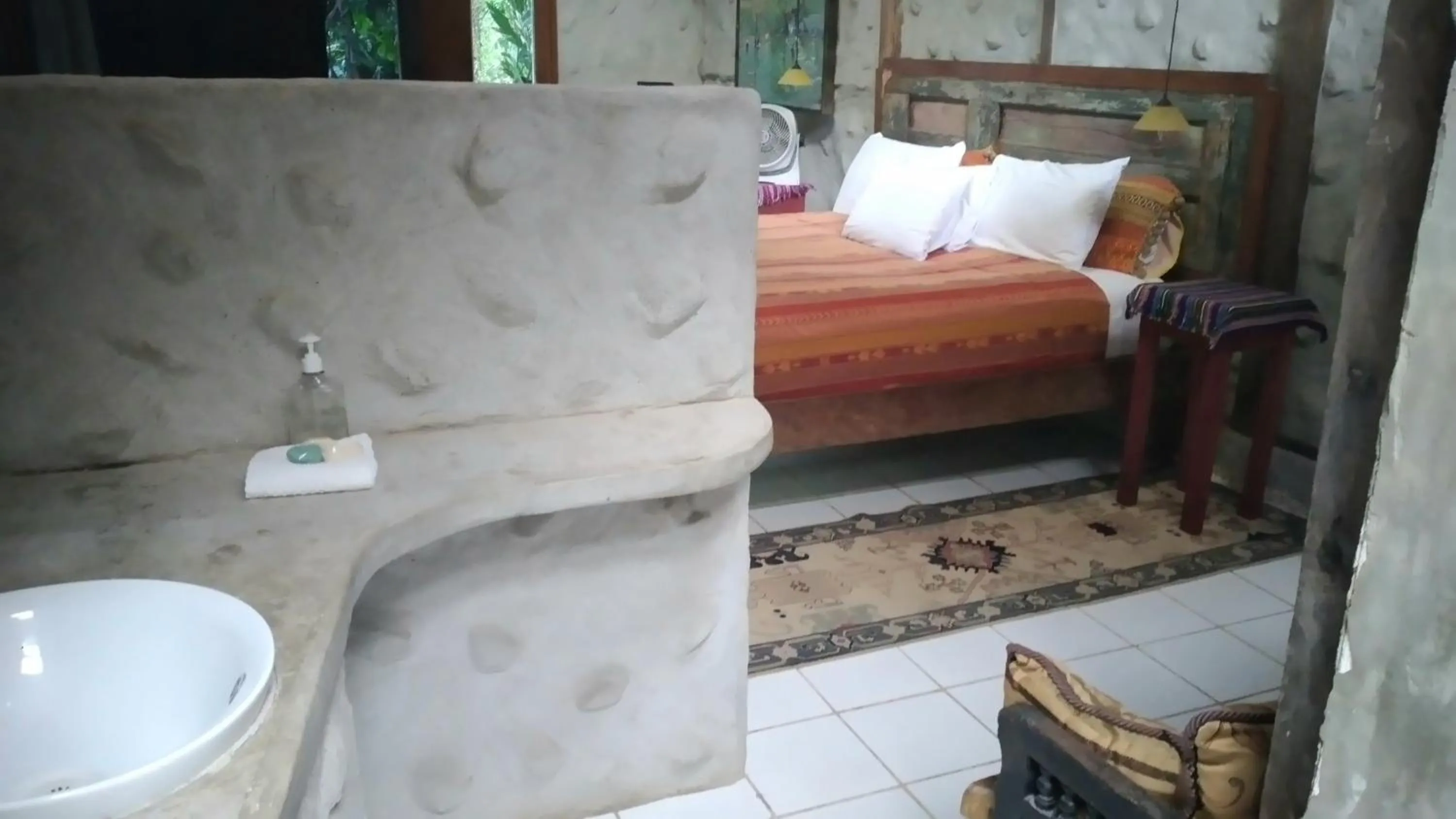 Bed in Tortugal Boutique River Lodge