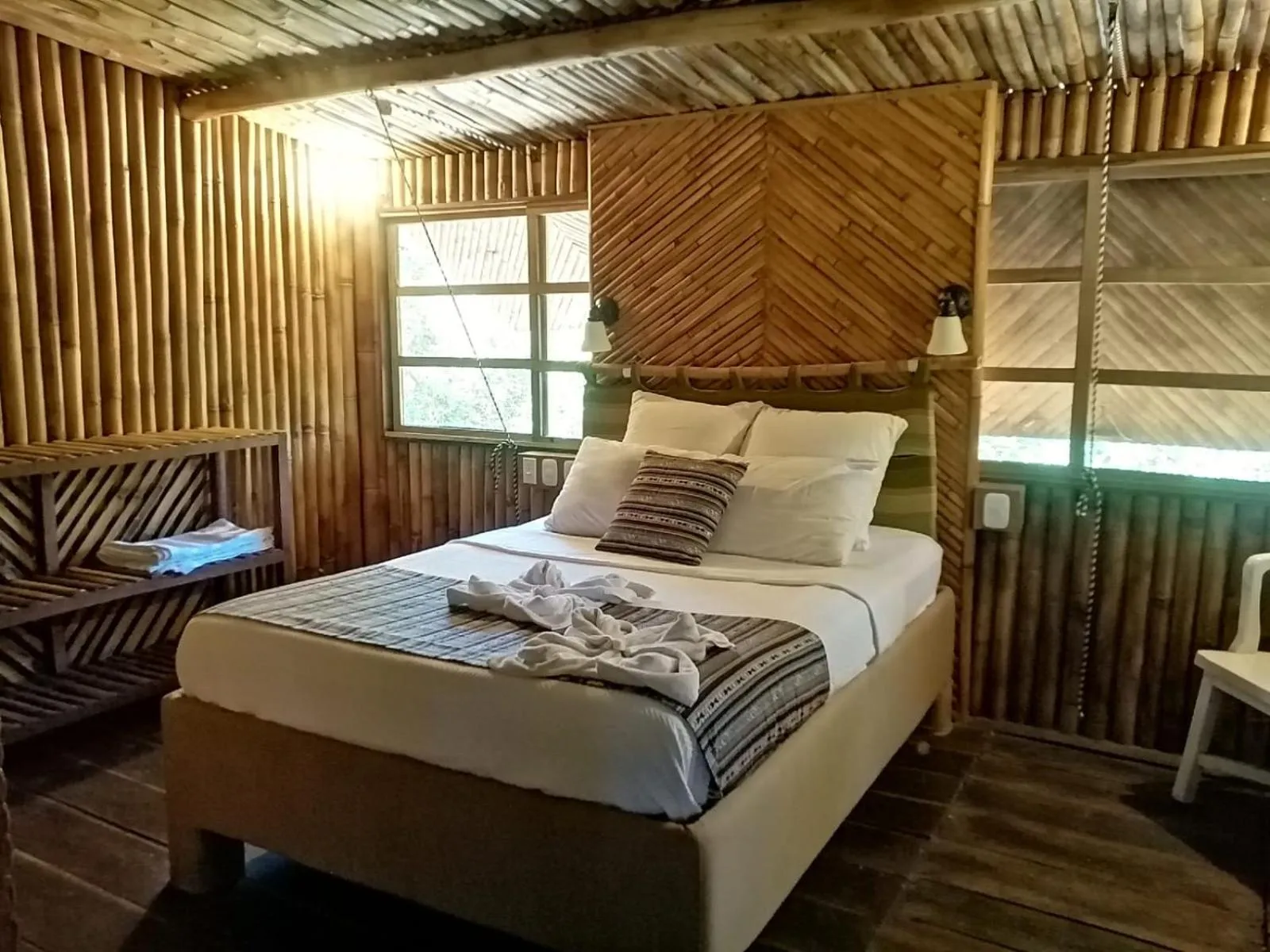 Bed in Tortugal Boutique River Lodge