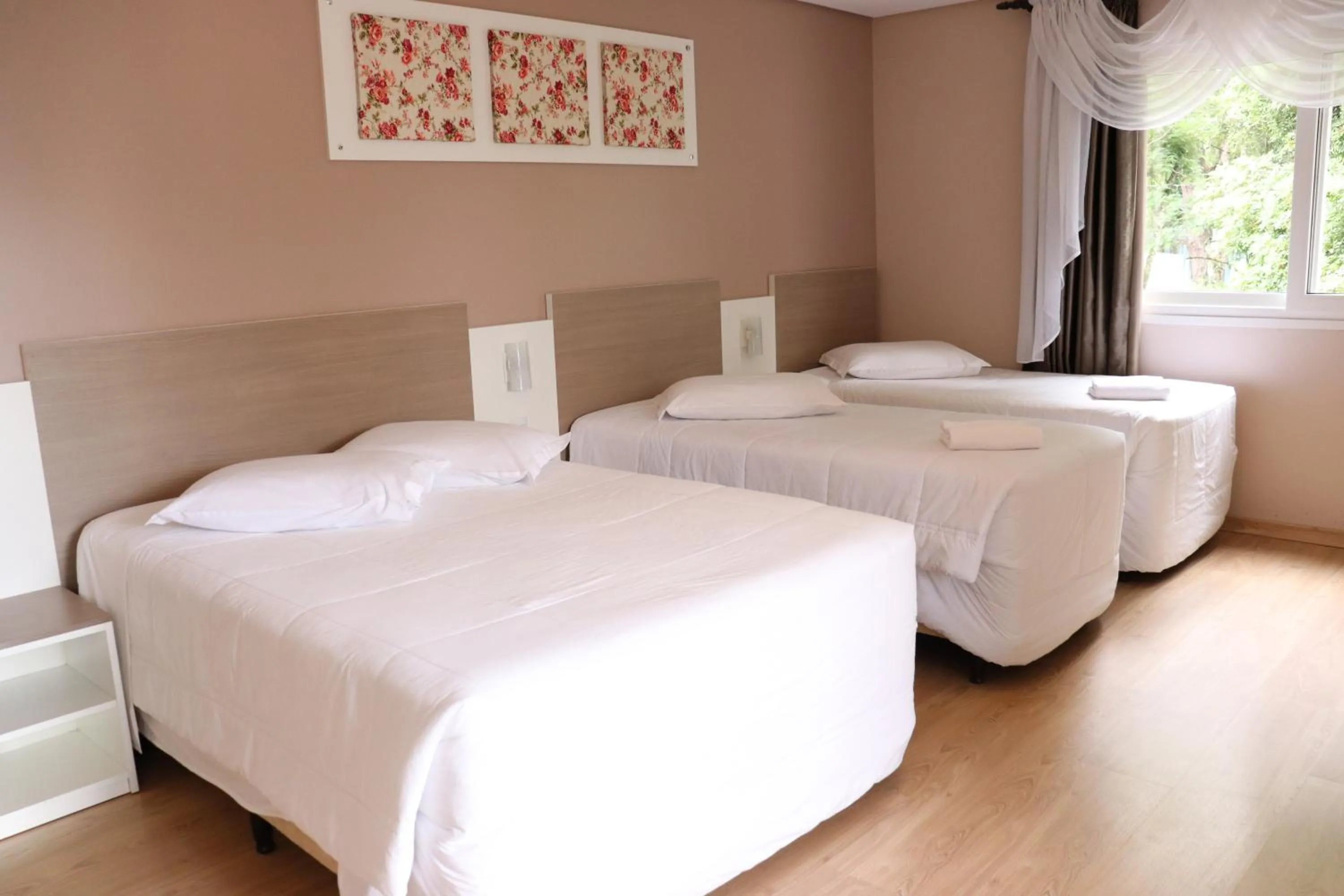 Bed in Pousada Vovô Nino