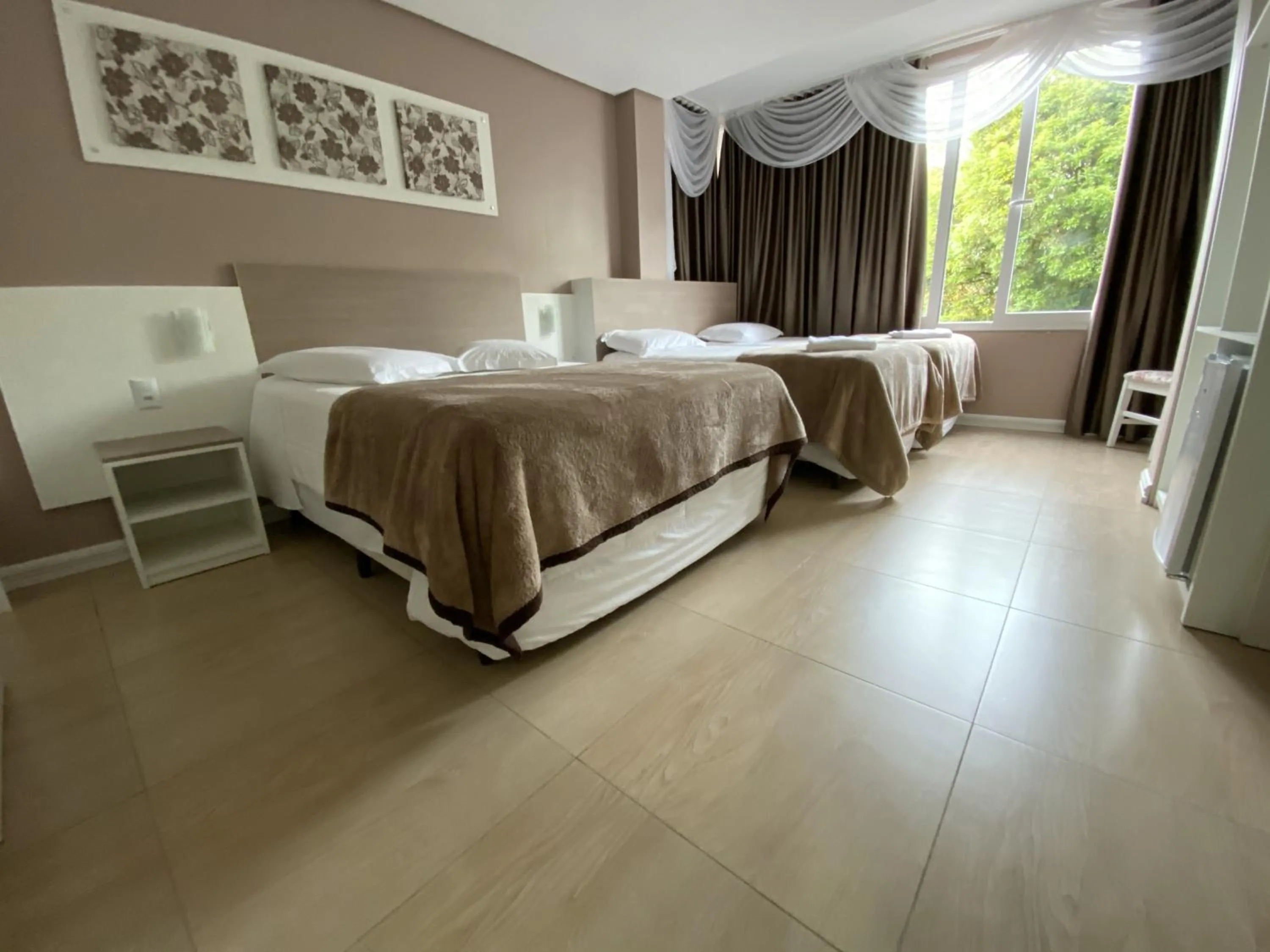 Bed in Pousada Vovô Nino