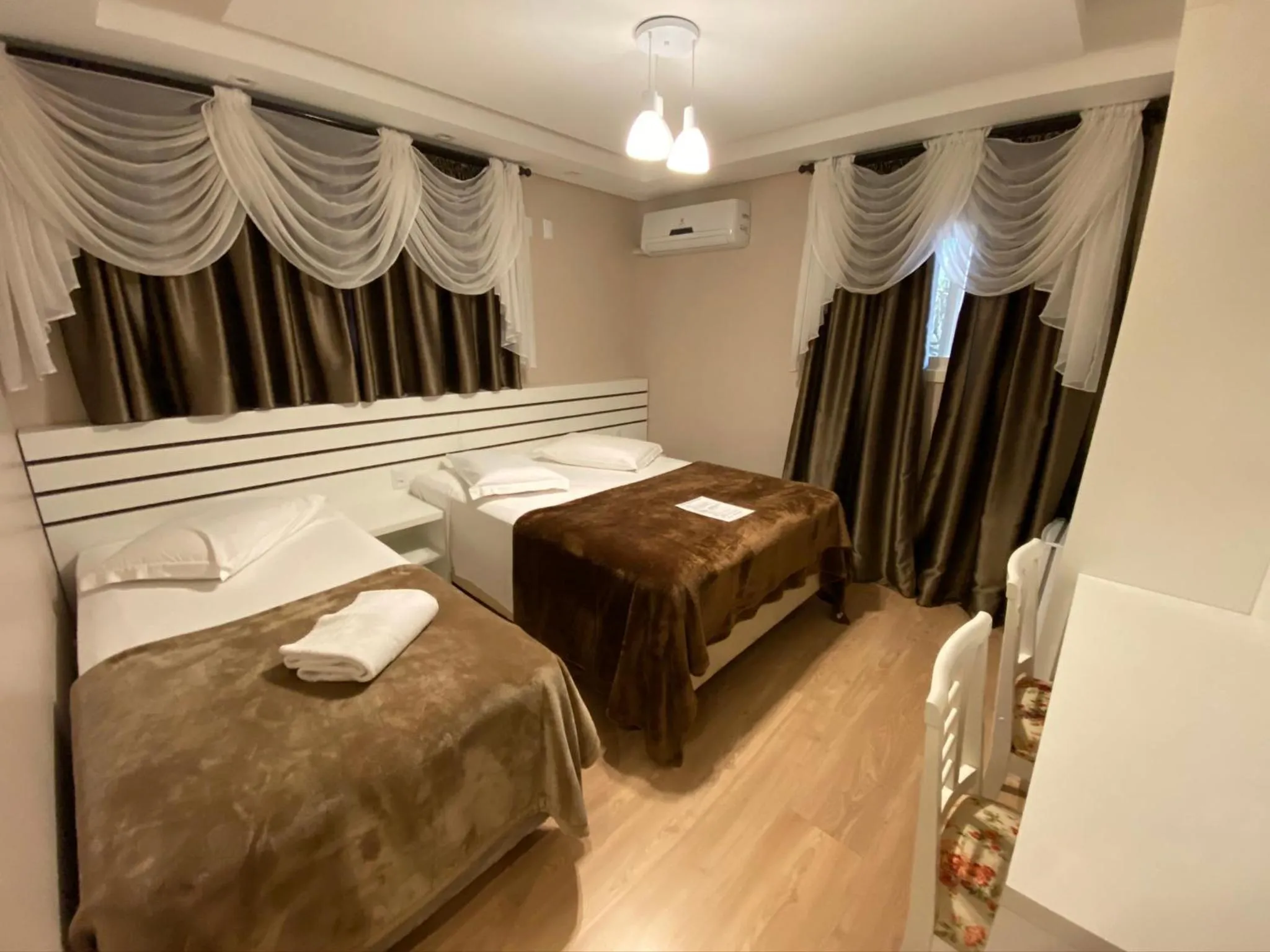 Bed in Pousada Vovô Nino