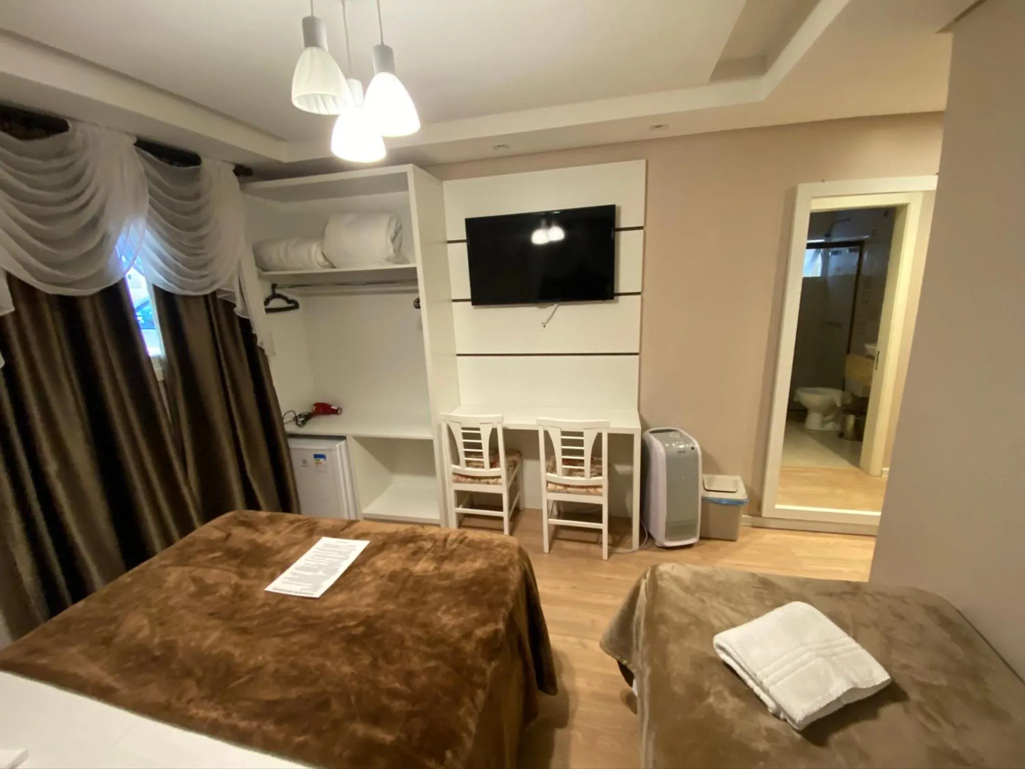 Bed in Pousada Vovô Nino