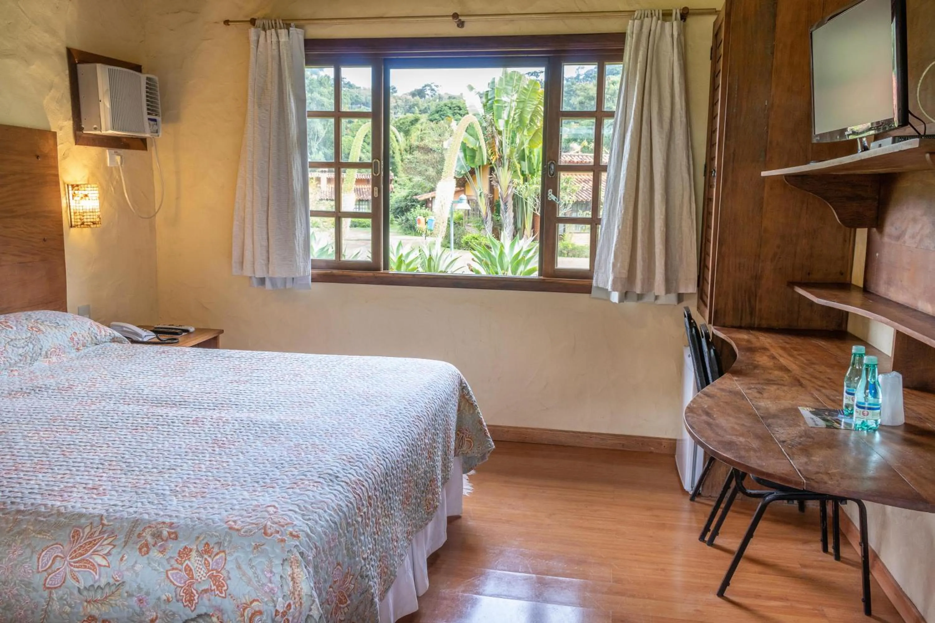 Bed in Bomtempo Itaipava Hotel by Castelo Itaipava