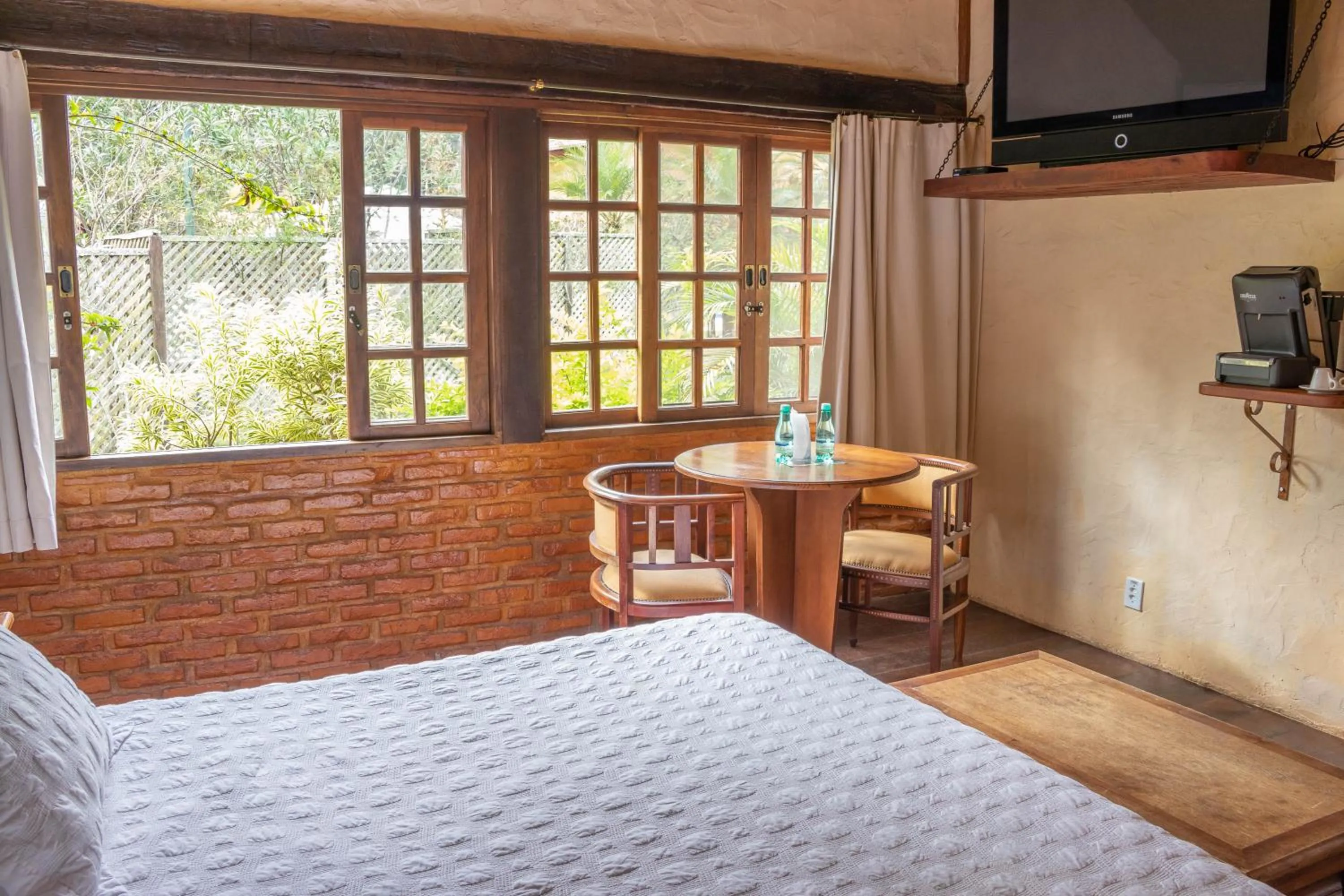 Bed in Bomtempo Itaipava Hotel by Castelo Itaipava