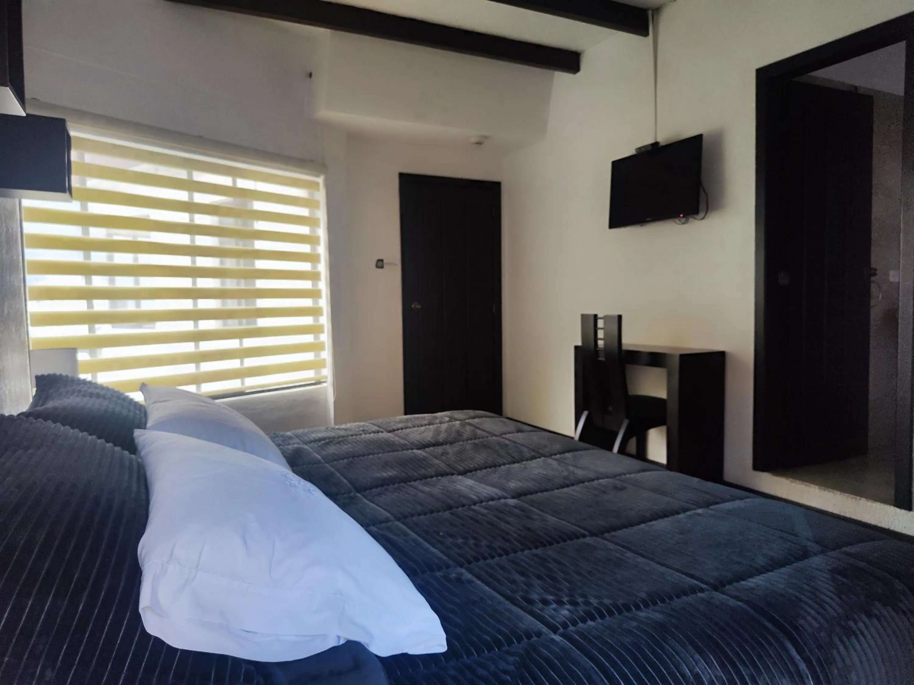 Photo of the whole room, Bed in Hotel Bellavista Quito