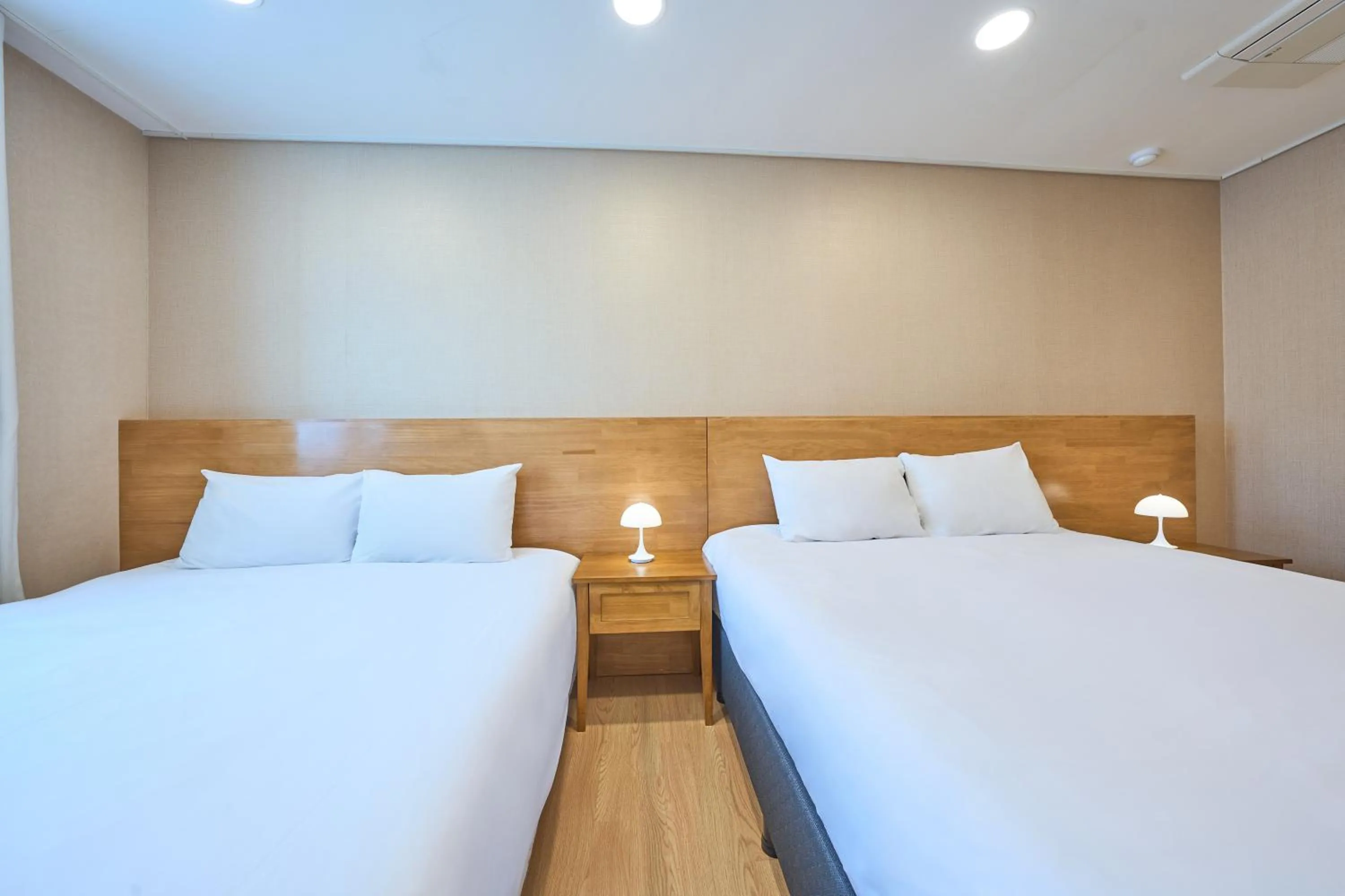 Bed in Pampas Hotel Jeju