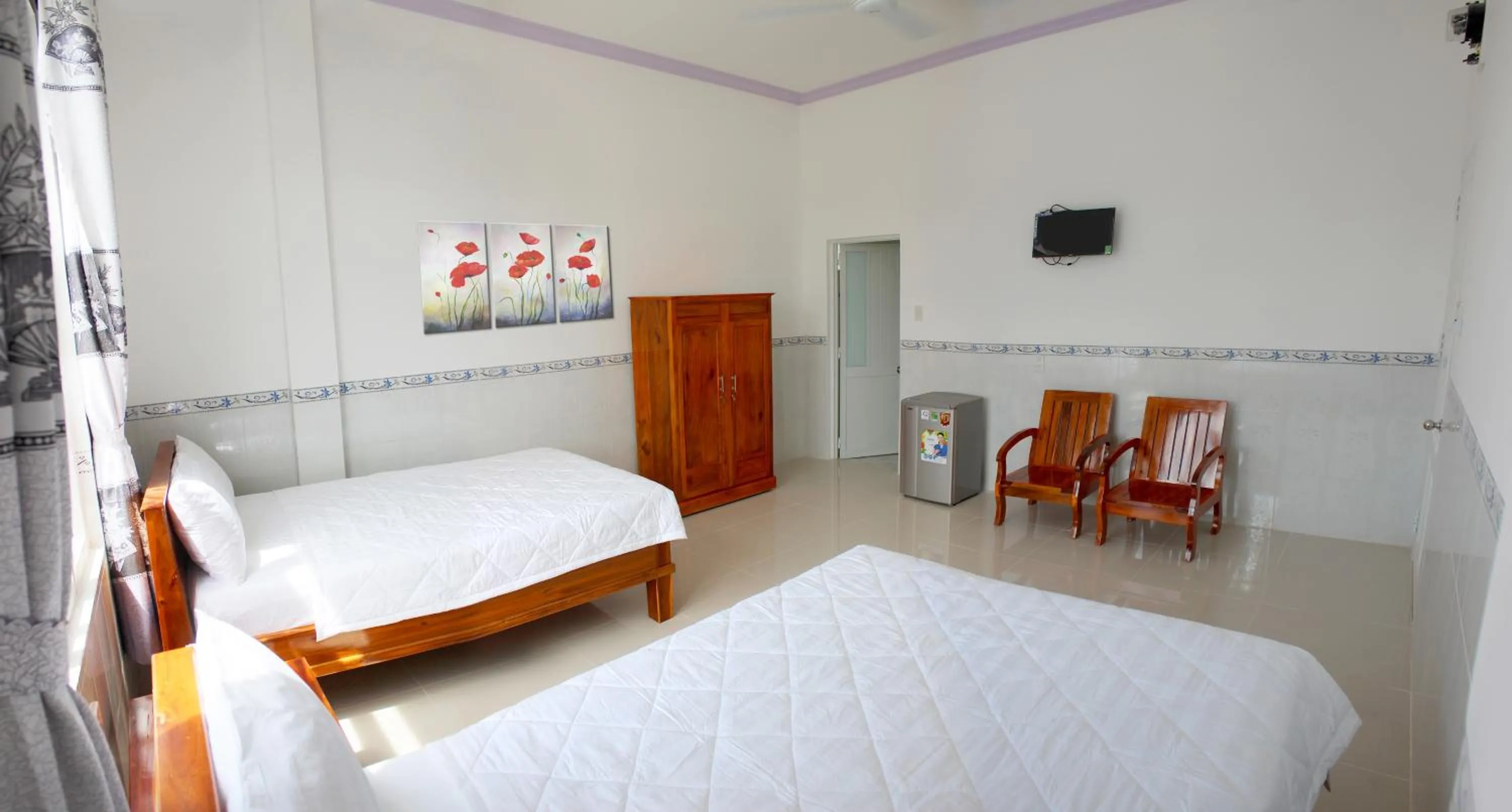 Bed in Hung Phuc Mui Ne Hotel