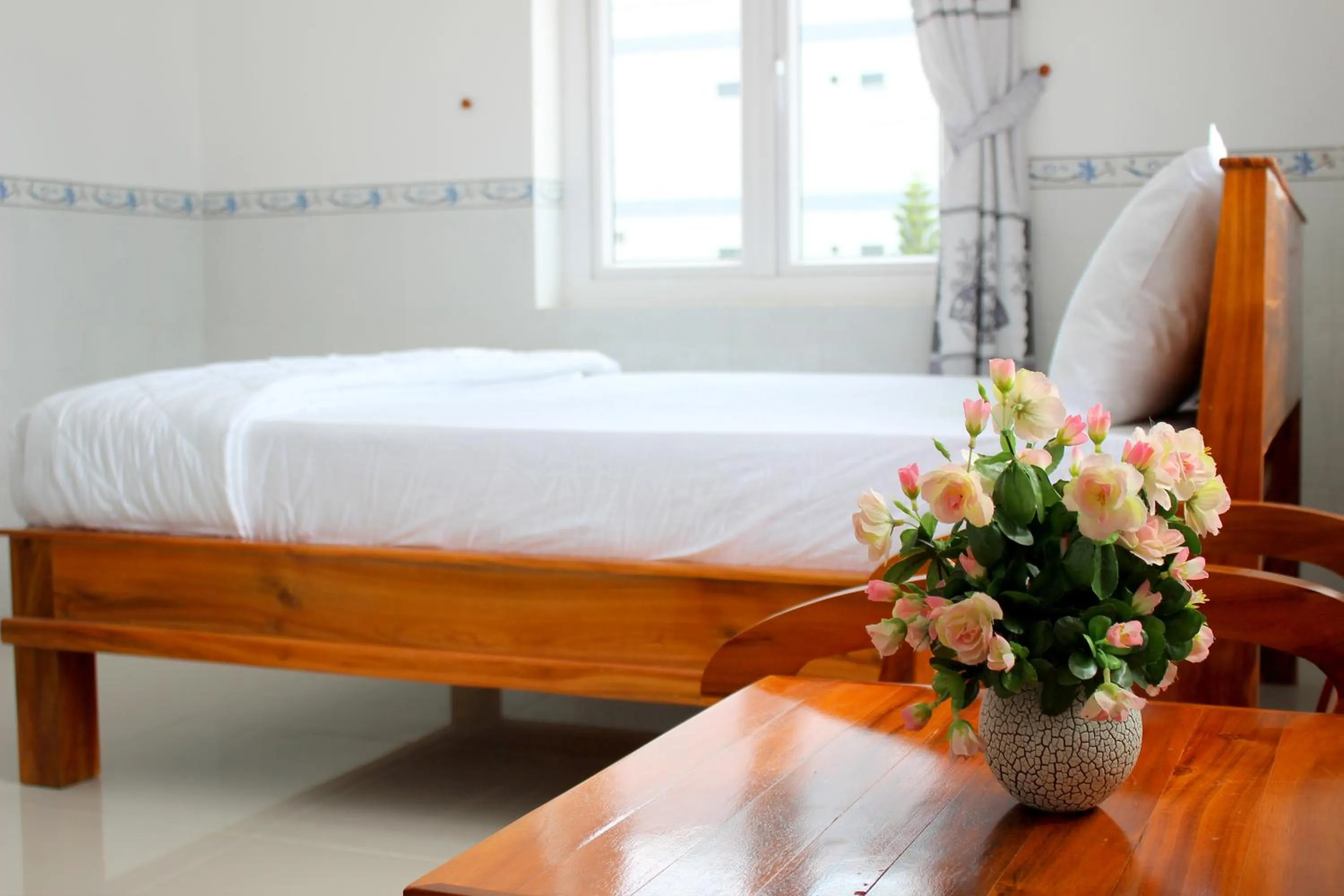 Bed in Hung Phuc Mui Ne Hotel