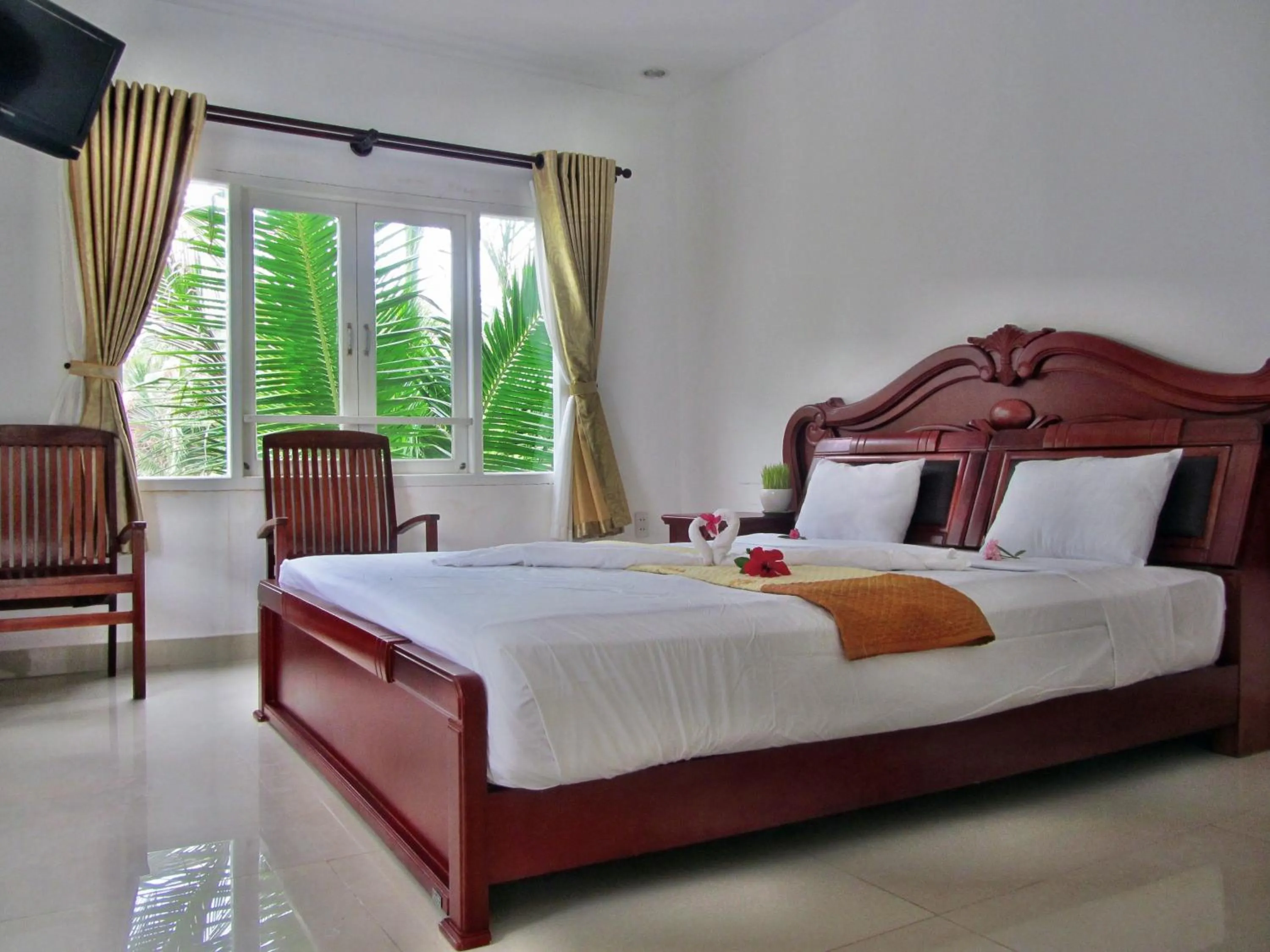 Bed in Hung Phuc Mui Ne Hotel