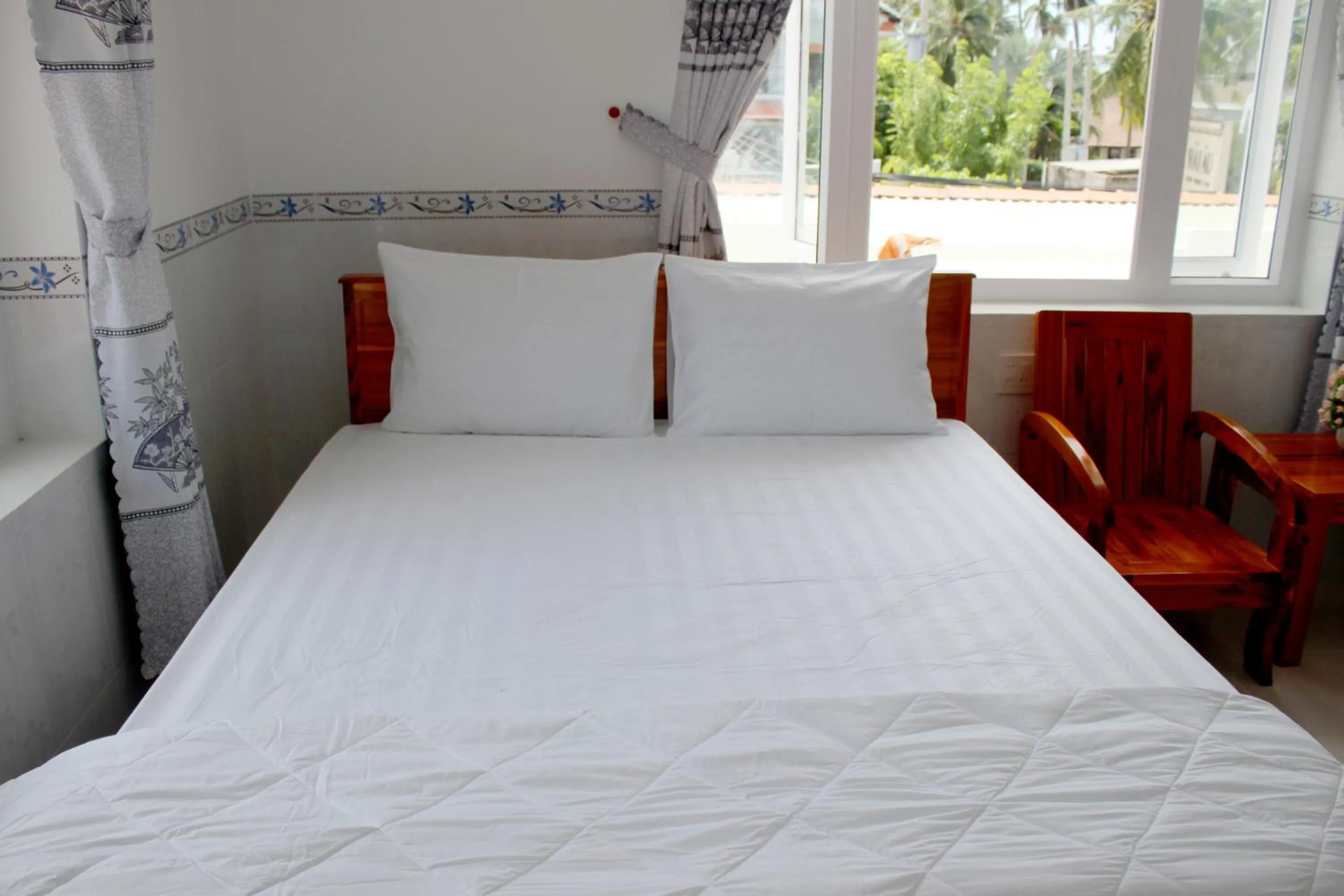 Bed in Hung Phuc Mui Ne Hotel