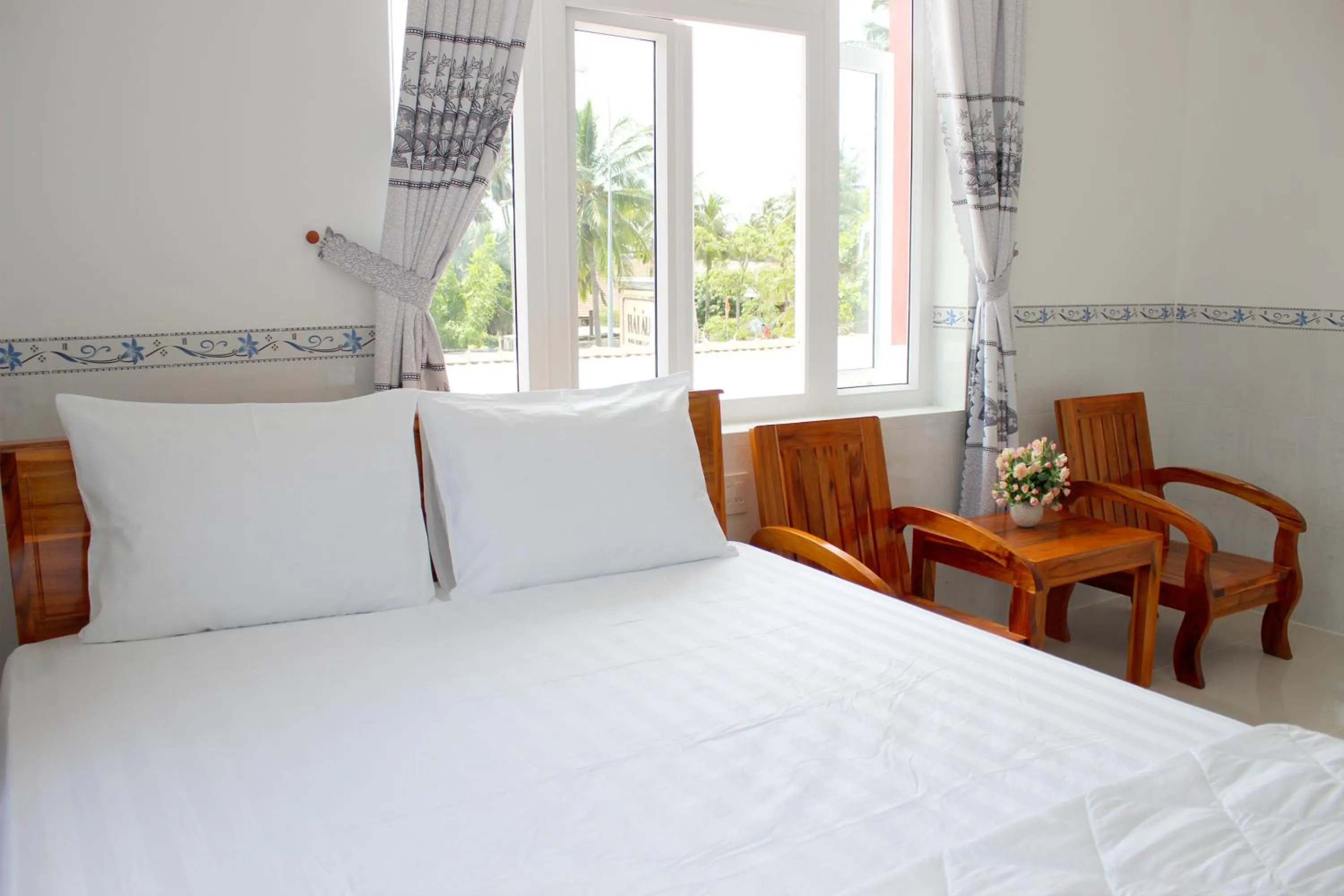 Photo of the whole room, Bed in Hung Phuc Mui Ne Hotel