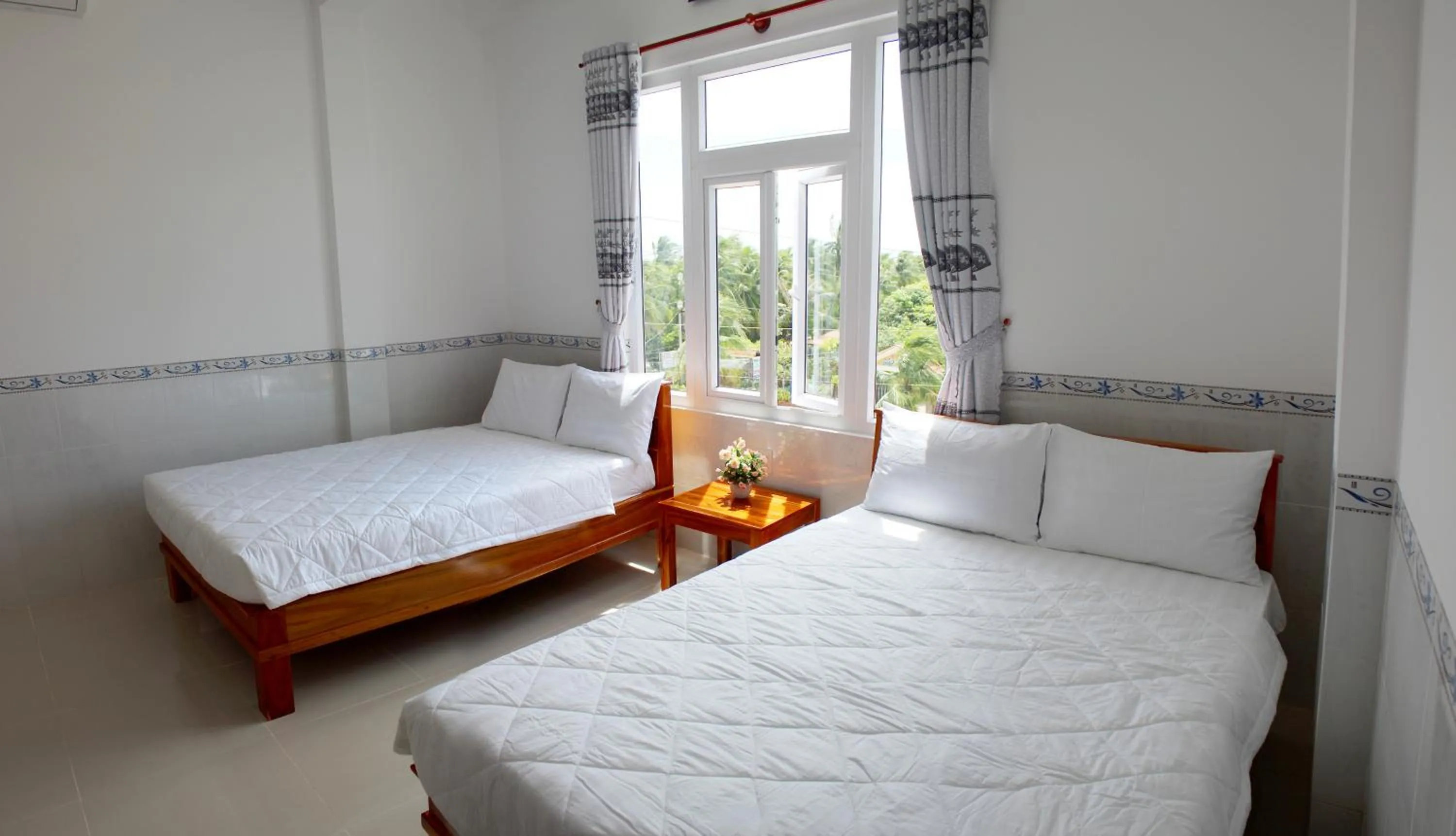 Bed in Hung Phuc Mui Ne Hotel