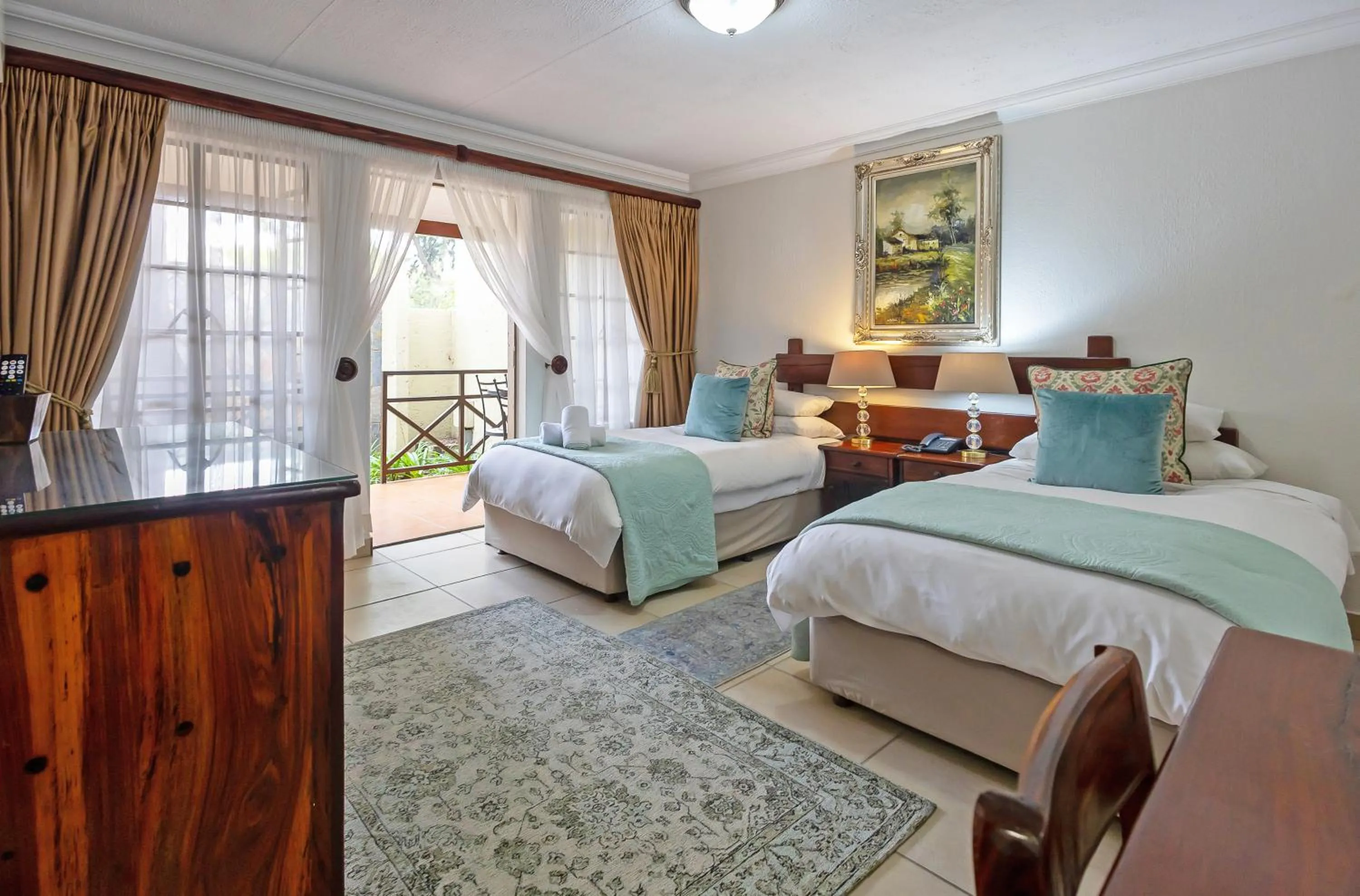 Bed in Afrique Boutique Hotel O.R. Tambo