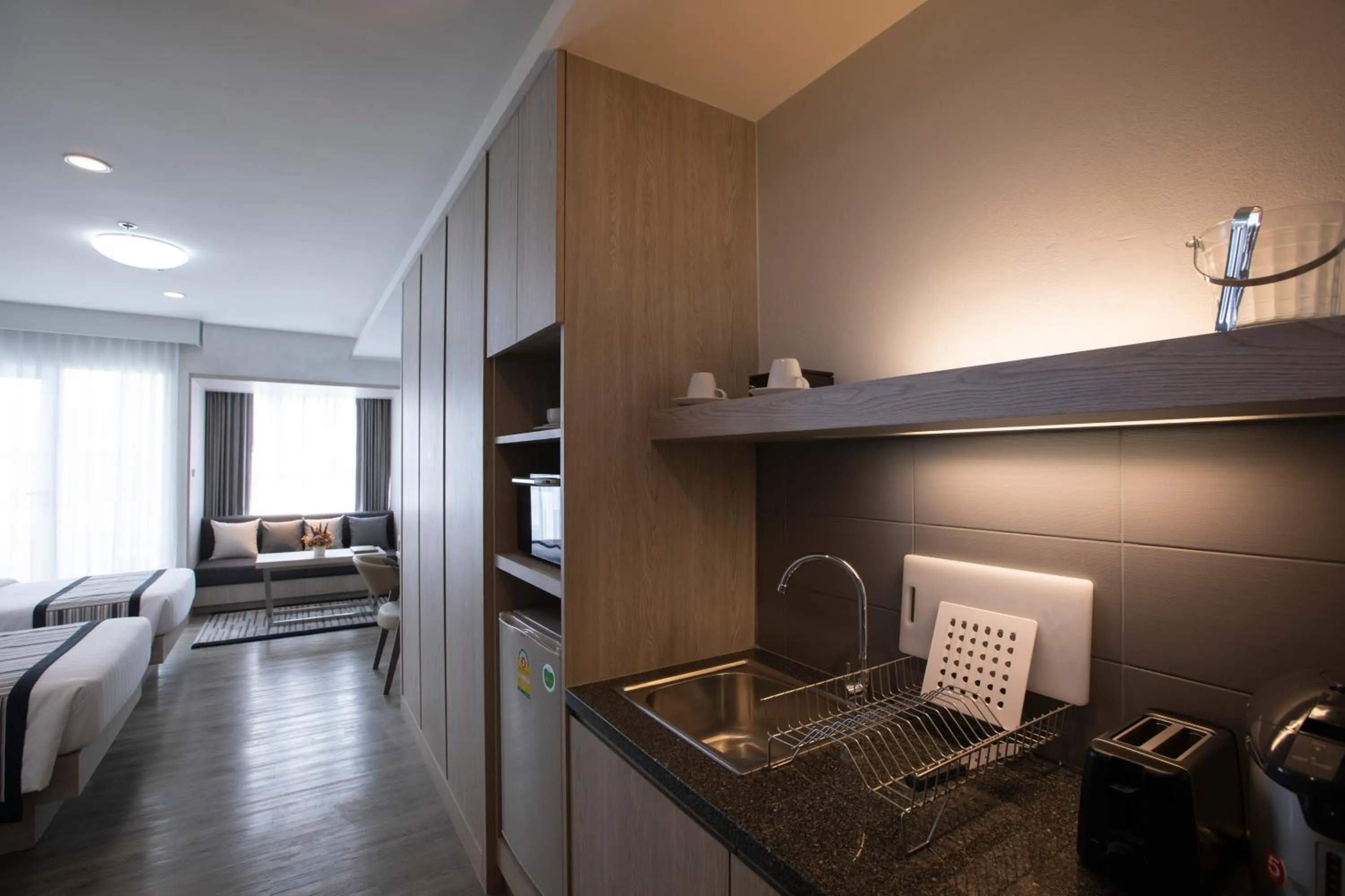 Kitchen or kitchenette, Bed in Kantary 304 Hotel Prachinburi