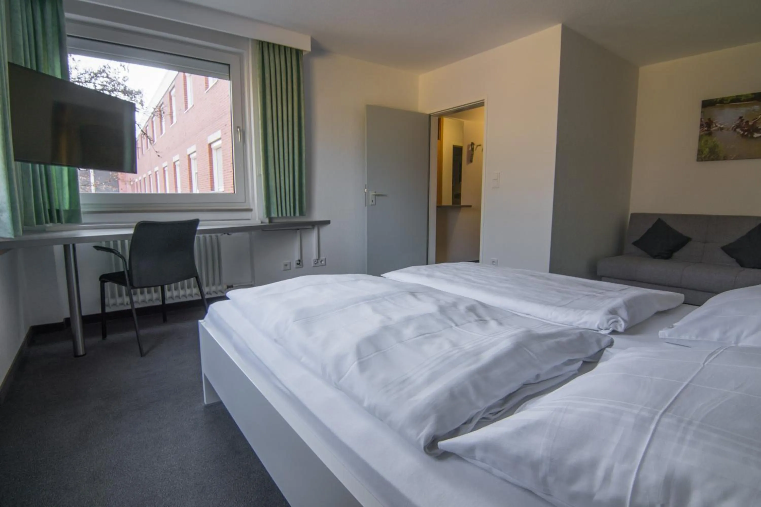 Photo of the whole room, Bed in Adventure Campus