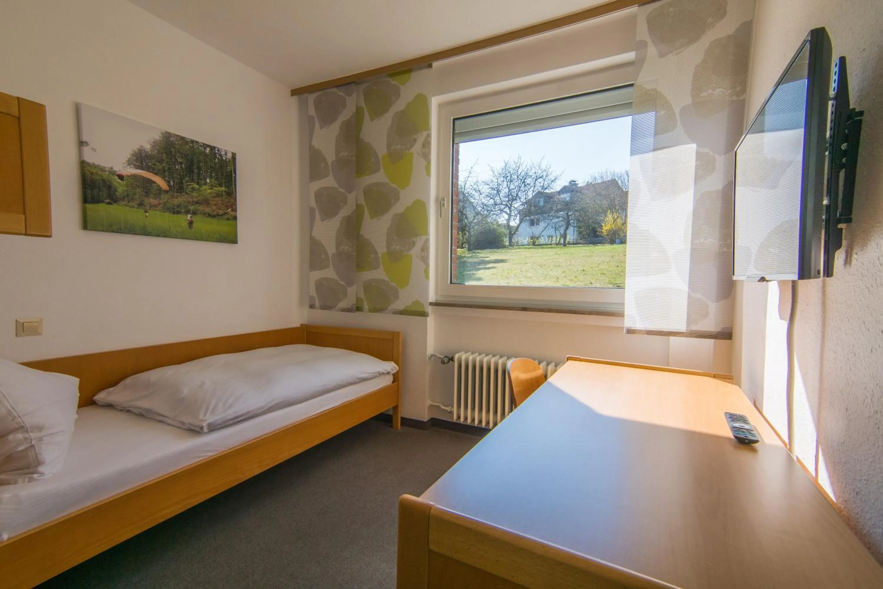 Photo of the whole room, Bed in Adventure Campus