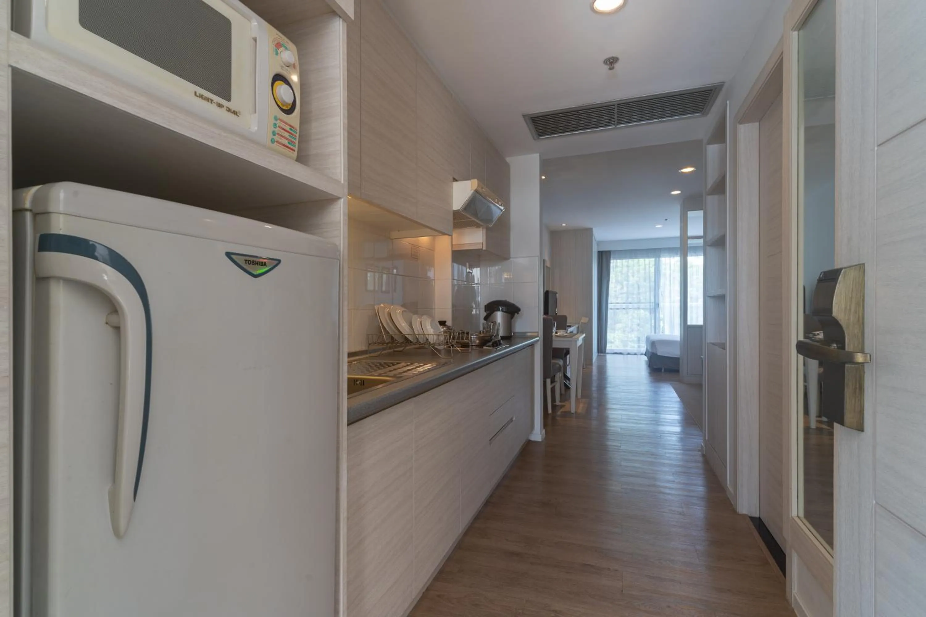 Kitchen or kitchenette in Classic Kameo Hotel and Serviced Apartments, Sriracha