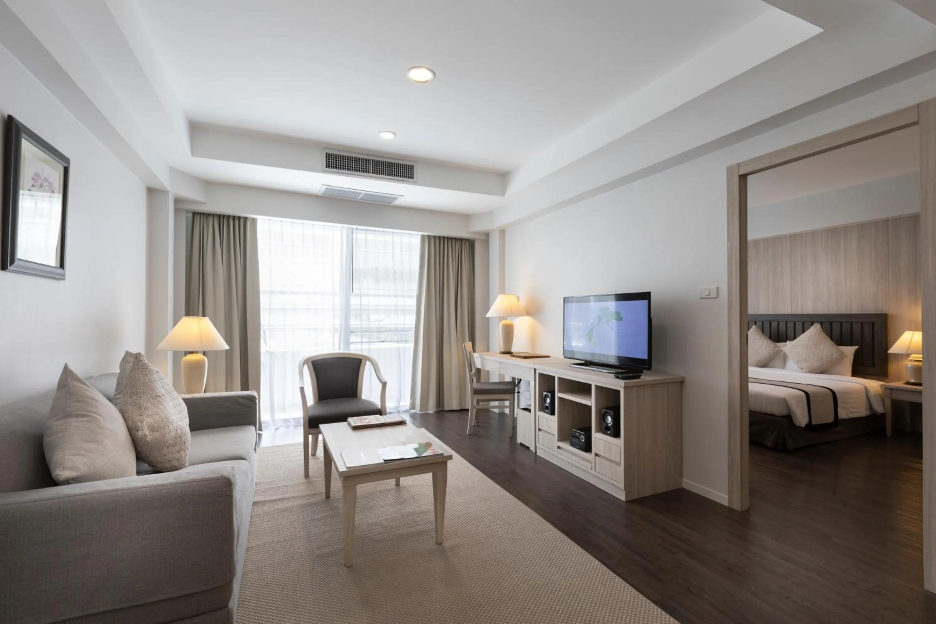 Living room, Bed in Classic Kameo Hotel and Serviced Apartments, Sriracha